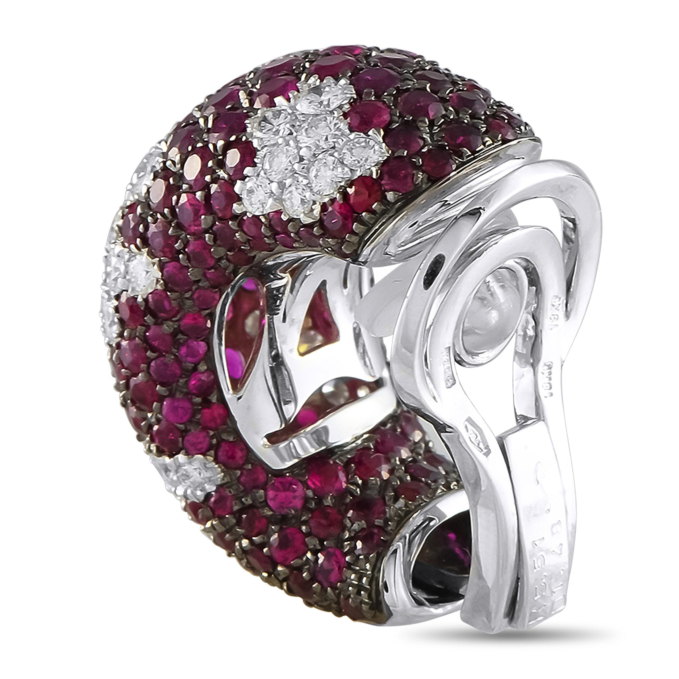 These luxury earrings will add color, texture, and dimension to any ensemble. The curved 18K White Gold setting comes to life thanks to inset Ruby gemstones with a total weight of 11.03 carats. Diamond accents totaling 2.97 carats add a touch of