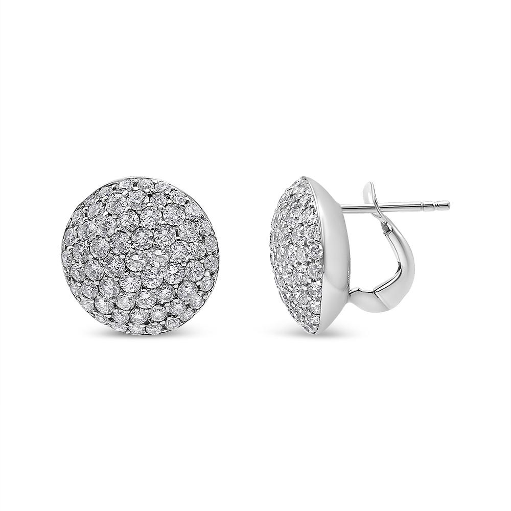 The perfect medium-sized stud, these disc shaped diamond studs are a no-brainer for your jewelry box. Perfectly sized at 17 mm in diameter, these diamond discs feature shared prong round diamonds in cool 18k gold. The shared prong setting reduces