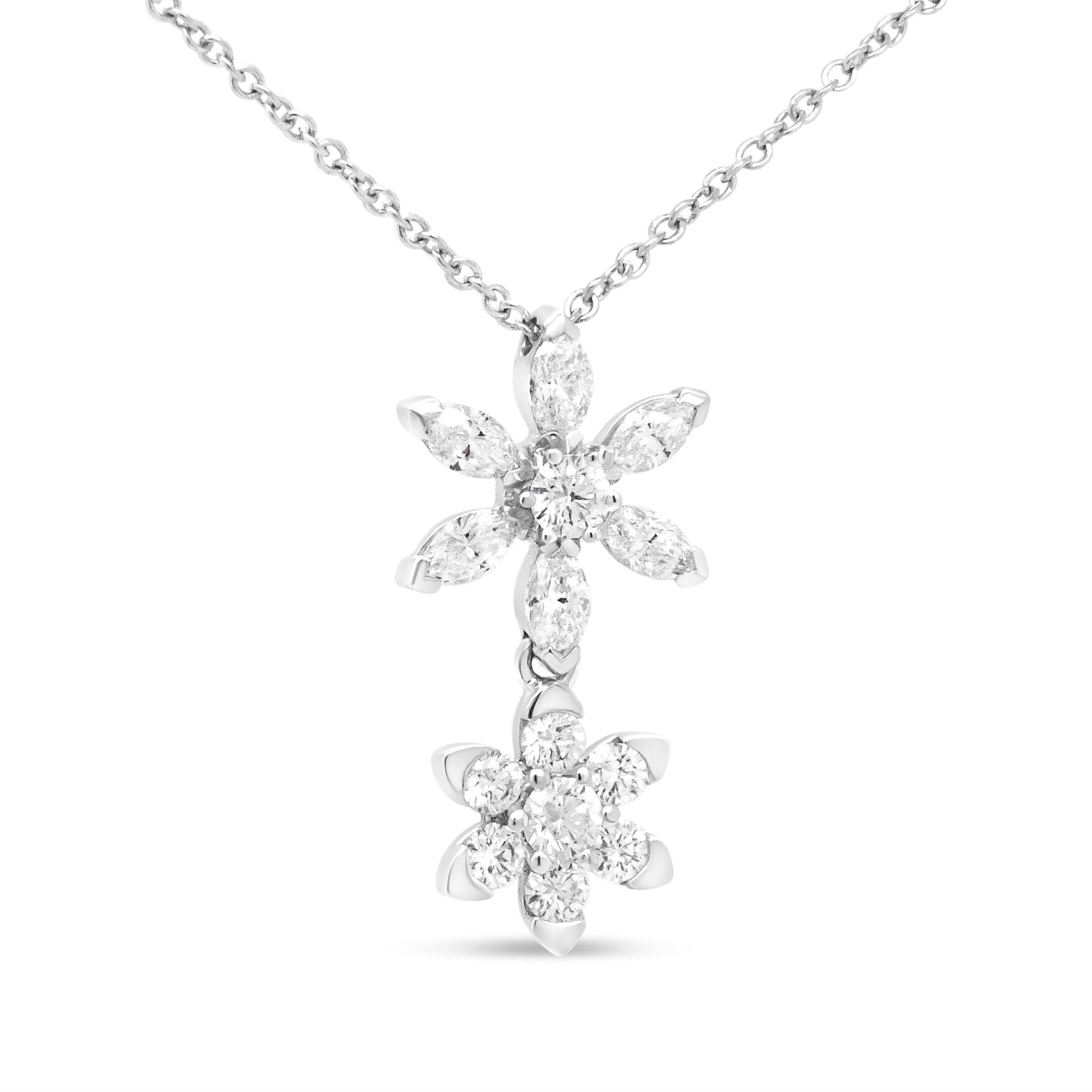 Perfect for year around wear, this stunning 18k white gold pendant necklace is inspired by the beauty of nature. Two unique floral blossoms extend from an 18