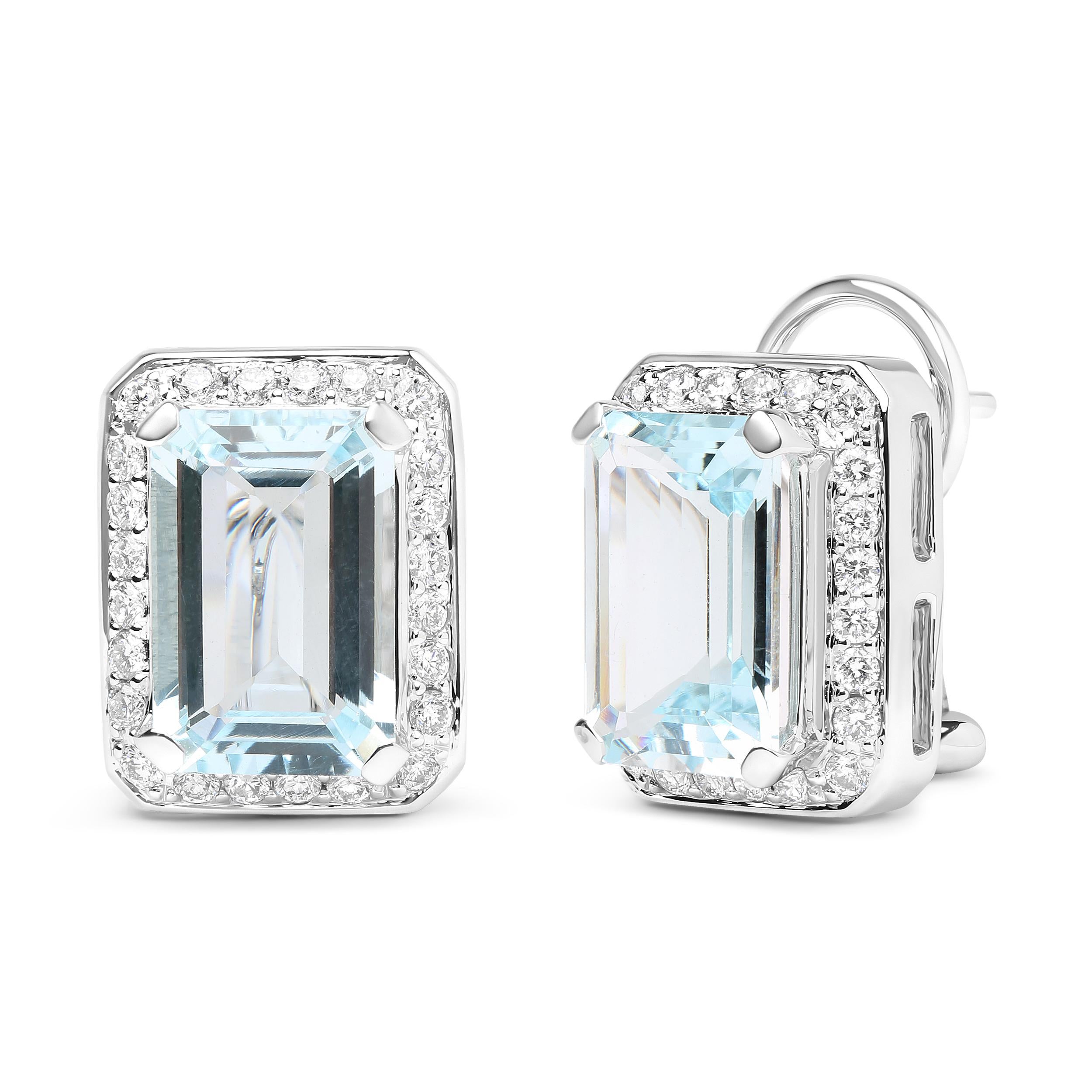 Budding with grace and elegance, these stud earrings bring a feminine energy crafted from genuine 18k white gold with natural gemstones and diamonds in a regal motif. At the center of each earring is a stately 13x9mm emerald-cut, heat-treated blue