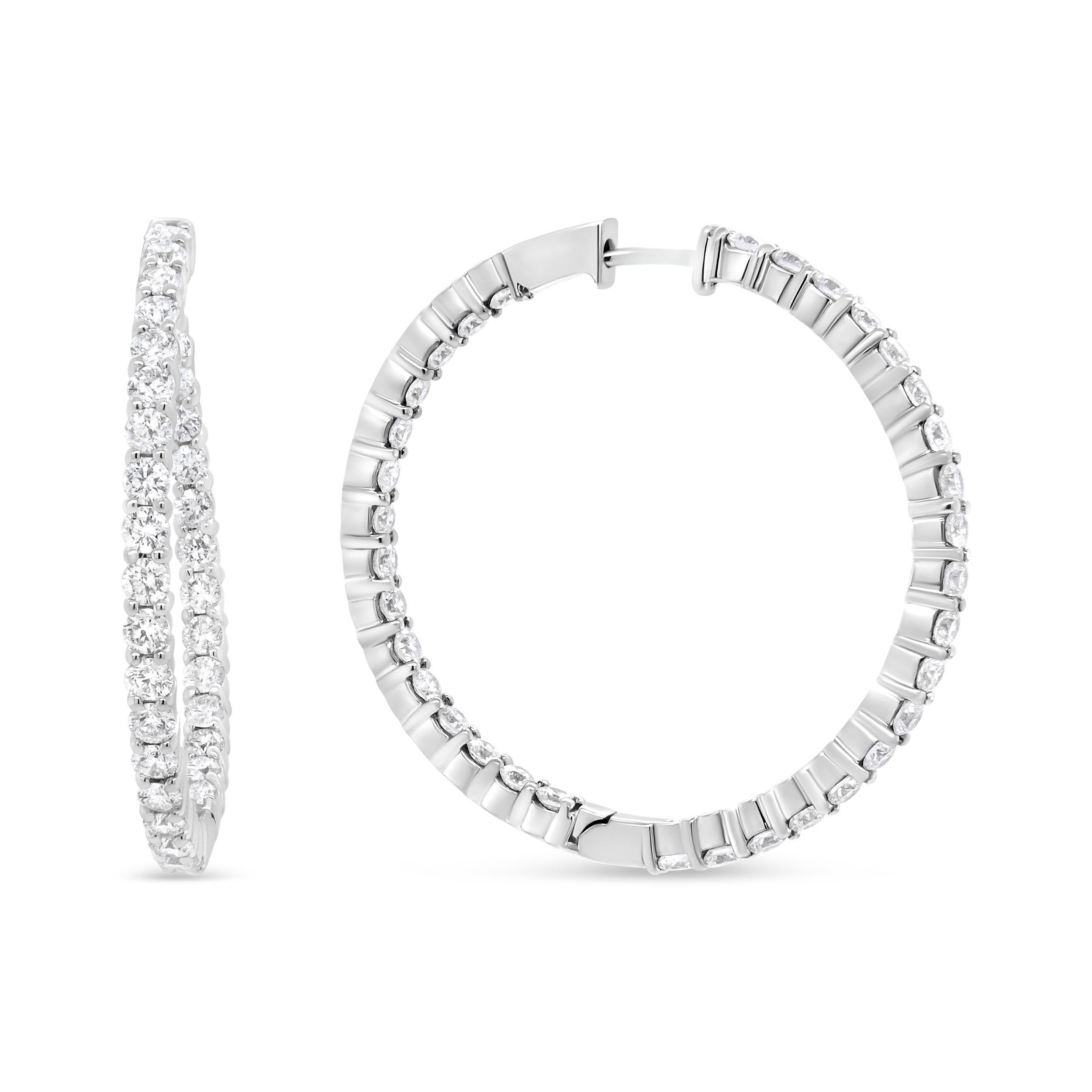 Strike a pose in these gorgeous inside-outside hoop earrings that radiate the luminosity of sparkling prong-set round diamonds. The curved silhouette and the inside-outside design of these hoops ensures maximum diamond exposure. These diamonds