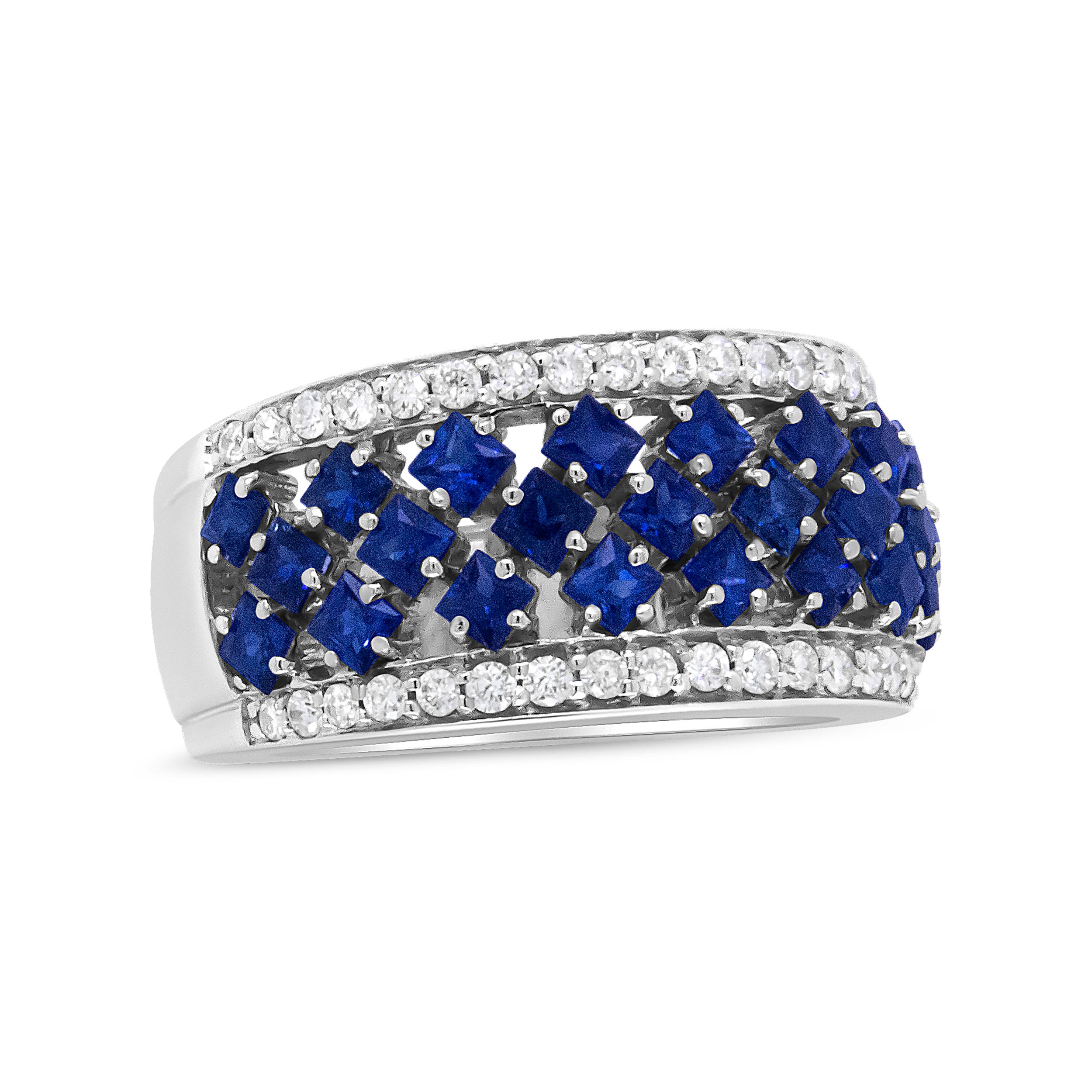 Crafted in genuine 18k white gold, this luxury fashion ring is elegant and refined in sparkling delight. Twenty-six 2x2mm princess-cut color-treated blue sapphires provide a rich color that stands out alongside the round white diamonds that frame