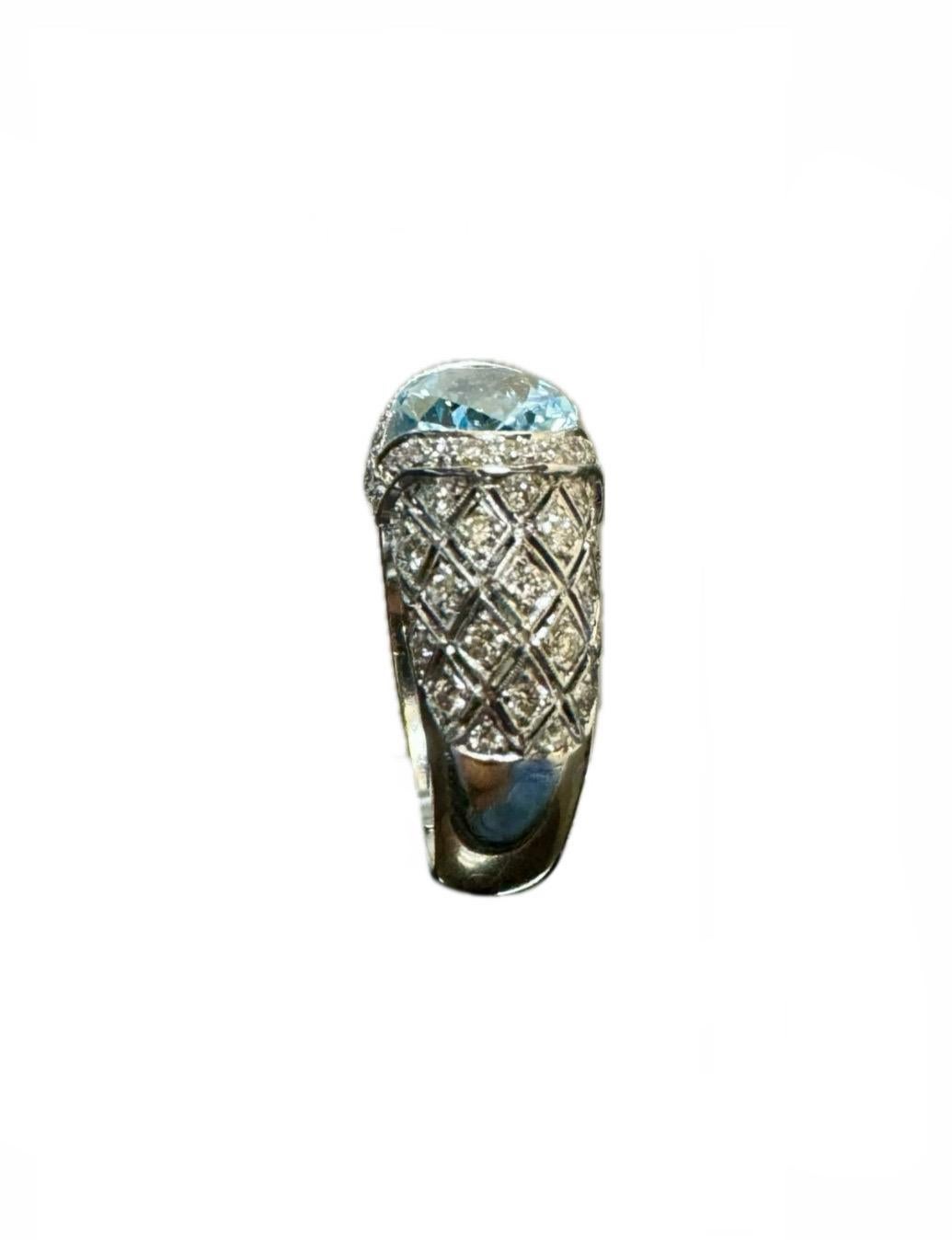 DeKara Designs Collection

Metal- 18K White Gold, .750.  11 Grams.

Stones- Center Features an Oval Aquamarine 3.00 Carats, 66 Round Diamonds H-I Color VS2 Clarity 0.66 Carats. 

Size- 6 3/4.  FREE SIZING

Beautiful Handmade Modern Timeless Diamond