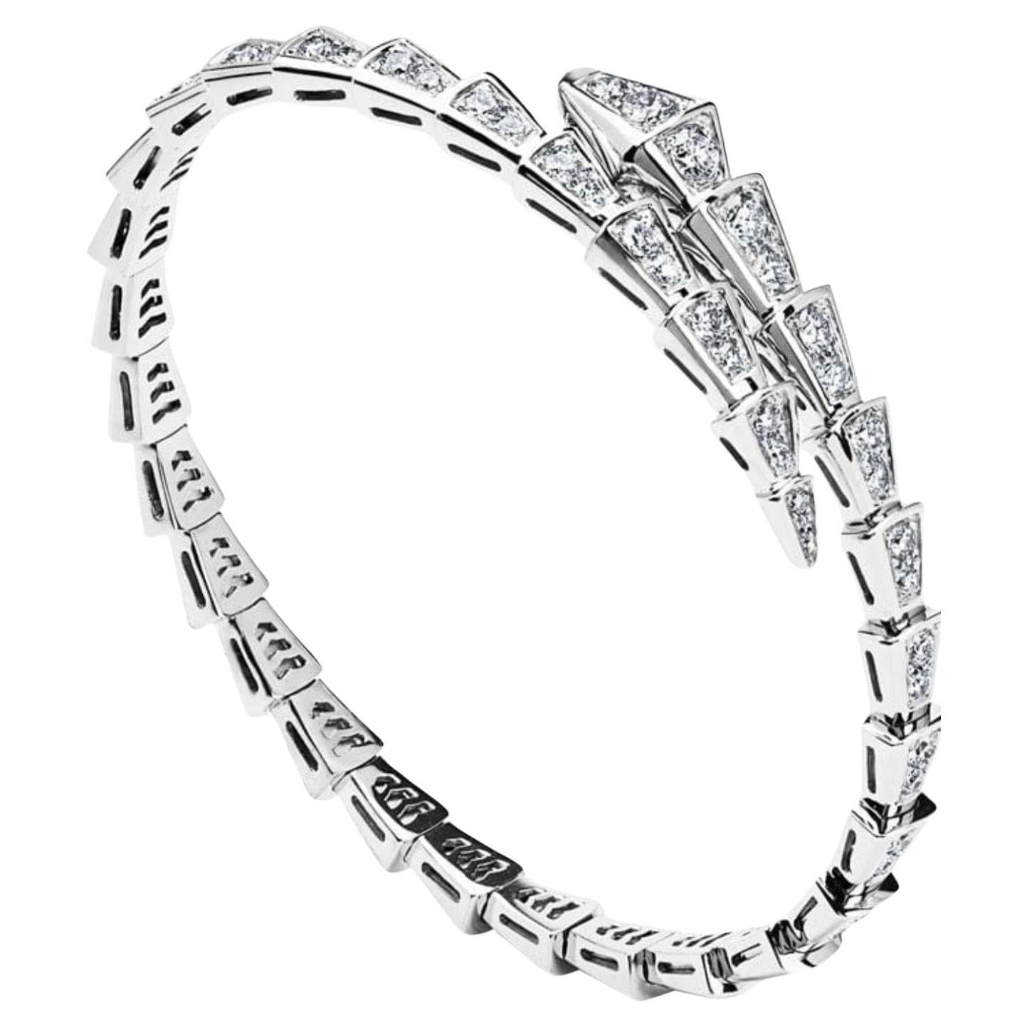This bangle is not by Bvlgari 
18k White Gold 3 Ct Pave Diamond Serpenti Viper Slim Bracelet in a size small
It will fit small  wrist
It is a tribute to the spirit animal, capturing seduction through a hypnotic design. This sophisticated jewel coils