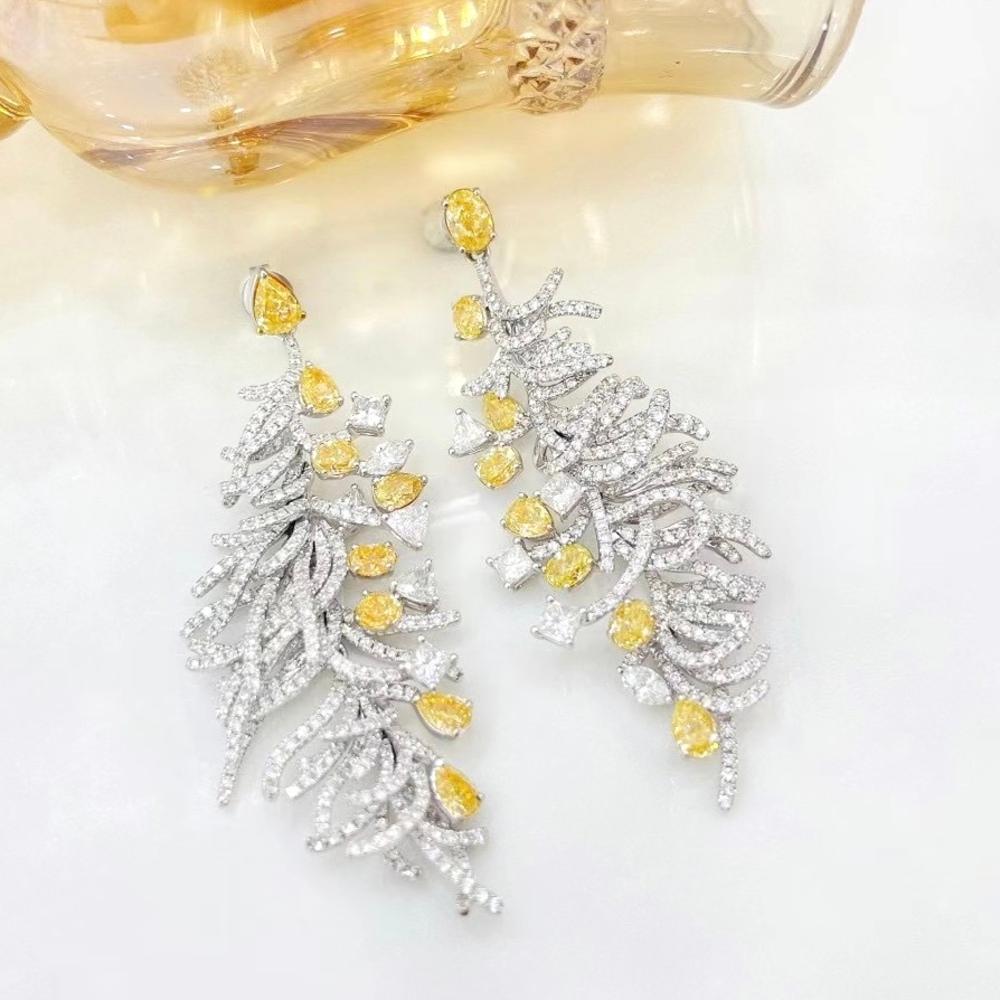 Orecchini con diamanti gialli fantasia in oro bianco 18 carati da 3,07 carati con diamanti

Diamanti gialli fantasia - 3.07 CT
Diamanti - 3,45 CT
Peso totale - 16,28 GM