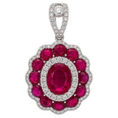 18k White Gold 3.22ctw Oval Ruby & Diamond Cluster Scalloped Flower Pendant