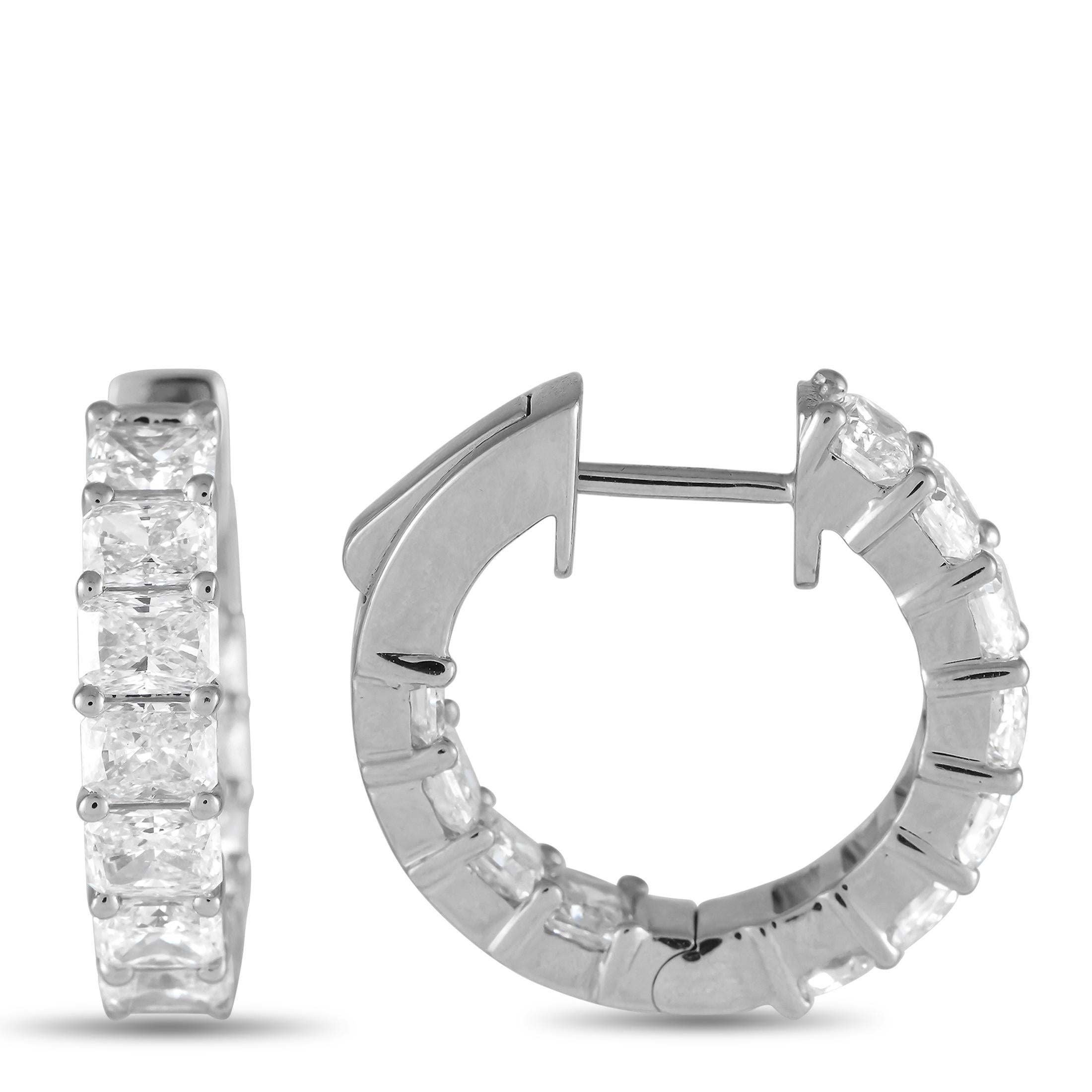 These luxury earrings are an elevated take on a classic accessory. Adorned with diamonds totaling 3.40 carats, each one of these impressive earrings features an 18K white gold setting measuring 0.65 round.This jewelry piece is offered in brand new