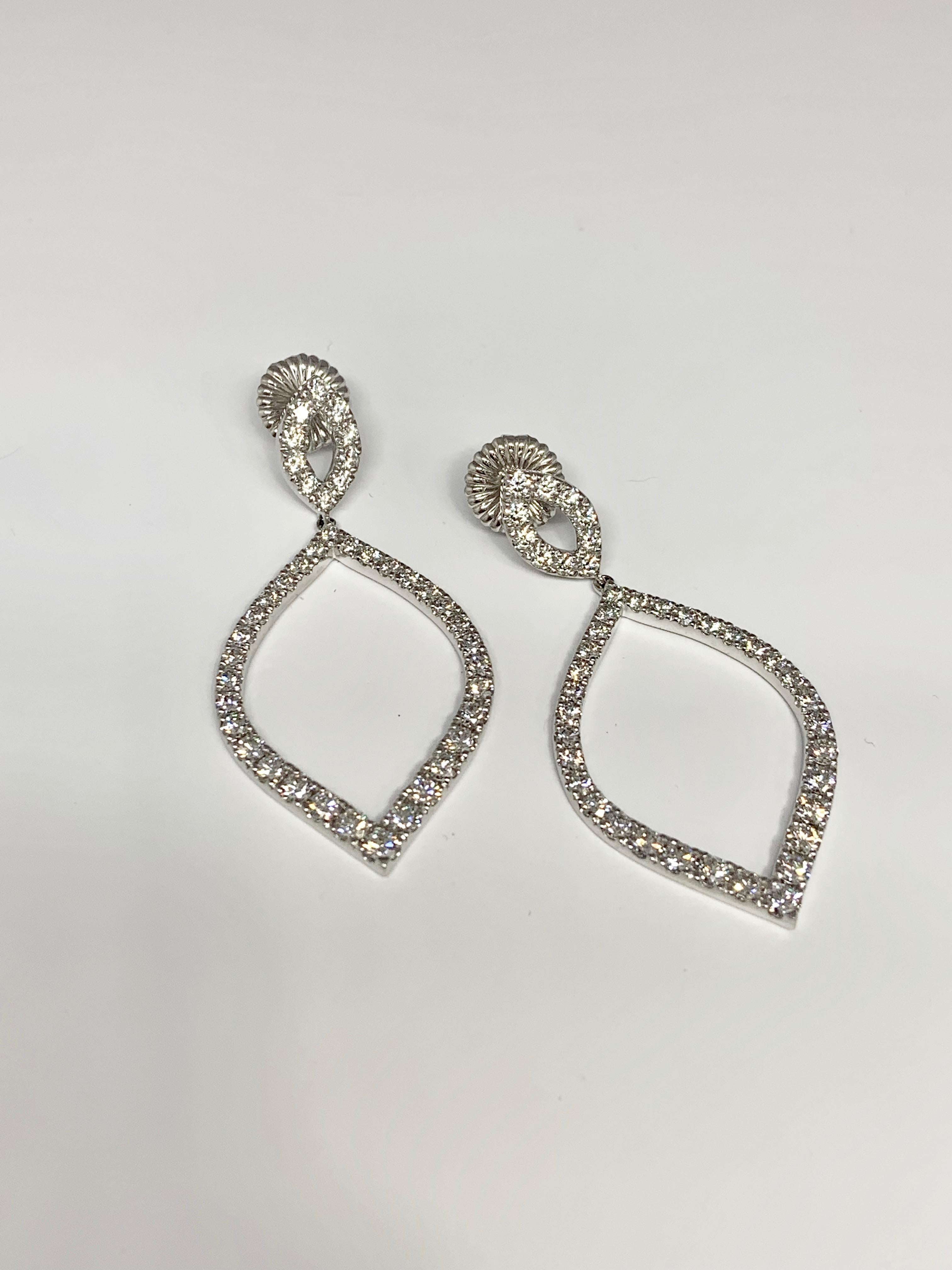 Round Cut 18 Karat White Gold 3.43 Carat Hearts on Fire Diamond Drop Earrings For Sale