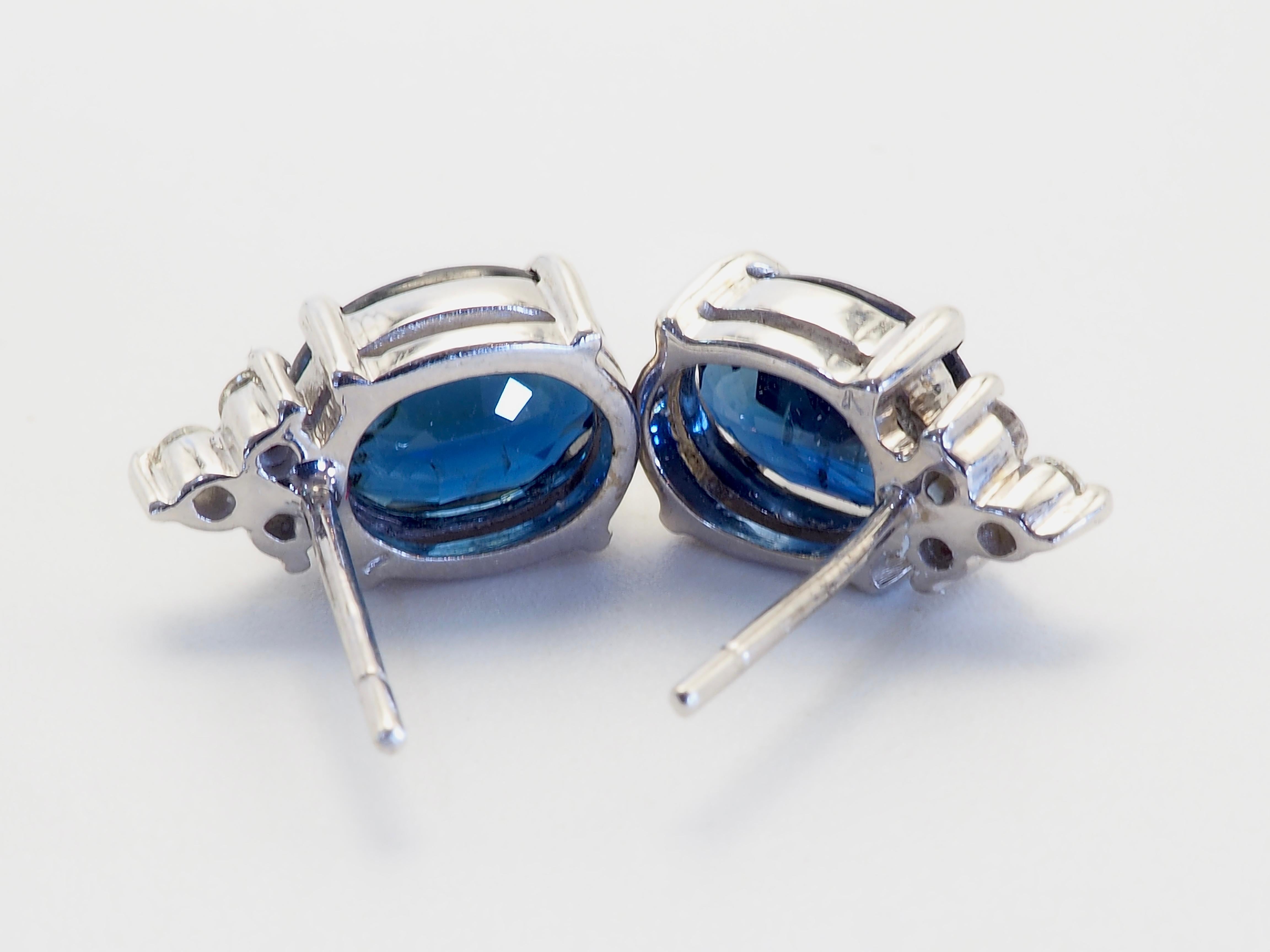 Presented here is a very fine and gorgeous oval blue sapphire and diamond stud earring. The oval sapphires are of decent sizes and have very nice deep blue tone and saturation with a lot of clarity but with minor inclusions visible with 10x