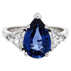 18k White Gold 3.9ctw GIA Pear Sapphire Unique Shield Cut Diamond Sides Ring