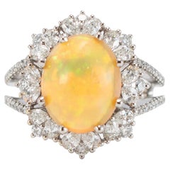 18K White Gold 4.18ct Fire Opal Halo Pear Shape
Round Diamond Cocktail Ring
