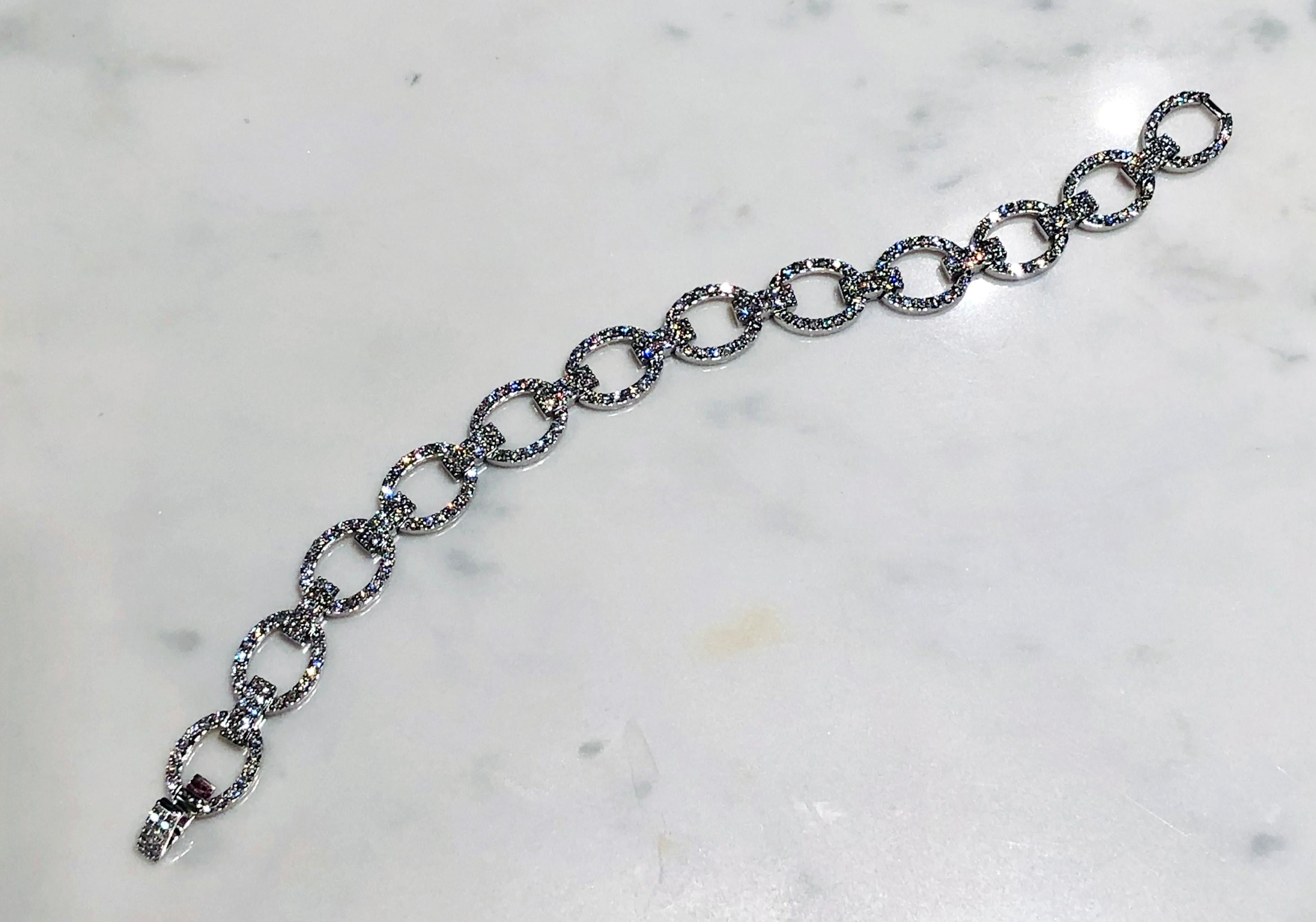 One 18ct White Gold Diamond Fancy Link Bracelet
Bracelet contains oval Diamond set Links
Total Diamond Weight: 4.26ct
Total Length: 7inches/18cm
Videos available on request.

This stunning diamond bracelet is show stopping piece. The diamond set
