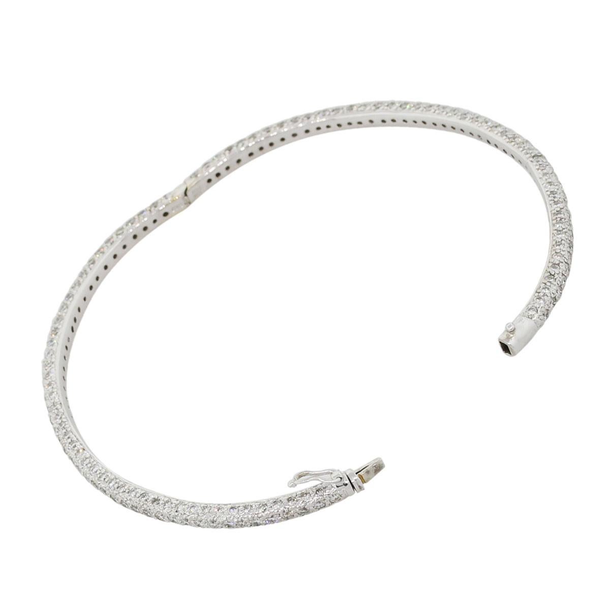 Material: 18k white gold
Diamond Details: Approximately 4.58ctw of round diamonds.
Total Weight: 11.4g (7.3dwt)
Bracelet Measurements: Will fit up to a 7″ wrist
Clasp Details: Tongue in box clasp with safety
Additional Details: Item comes complete
