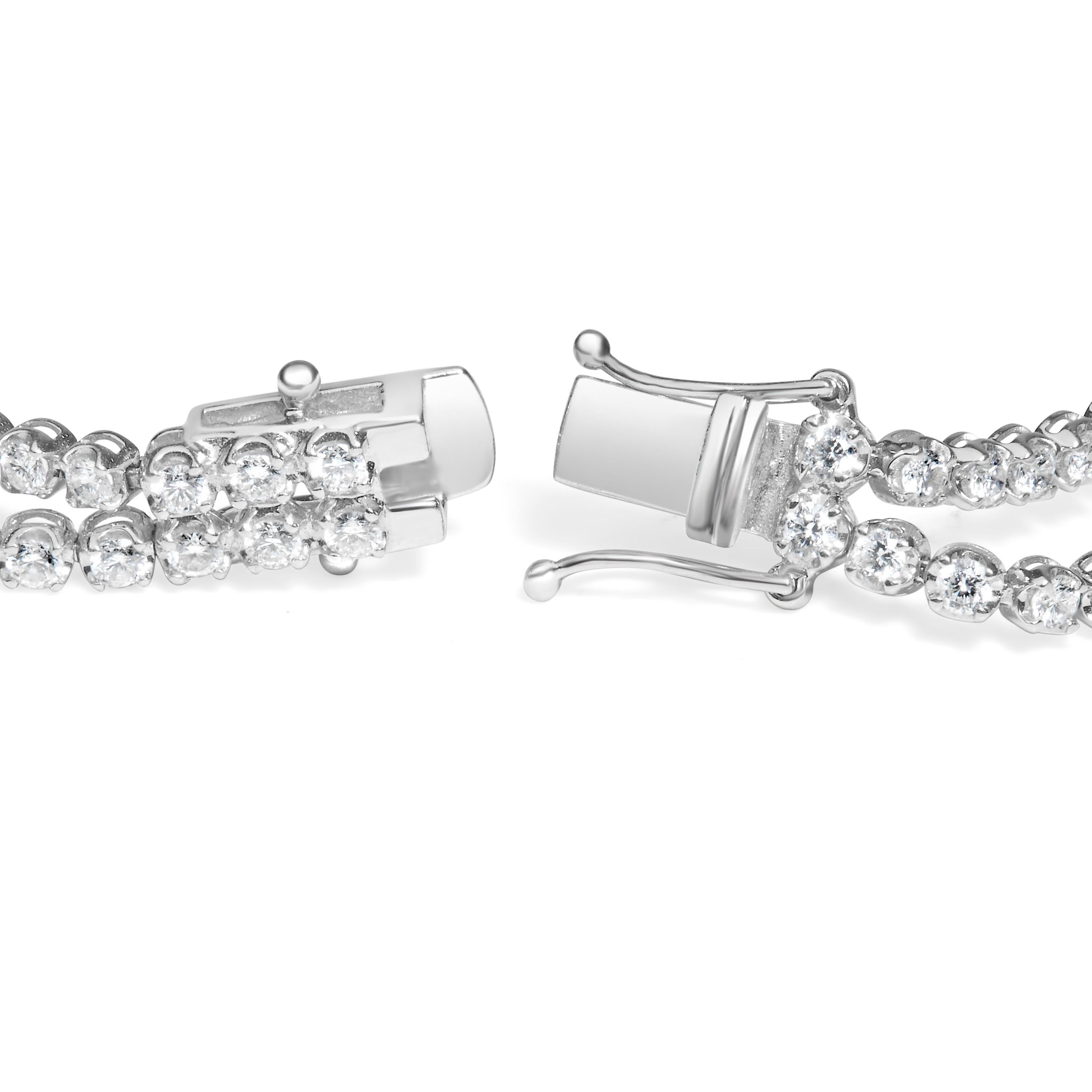 Embrace unparalleled elegance with this 18K white gold tennis bracelet, radiant in its double-row design adorned with 5 3/5 carats of natural diamonds. These gems, of pristine G-H color and impeccable VS1-VS2 clarity, dazzle in a symphony of light,