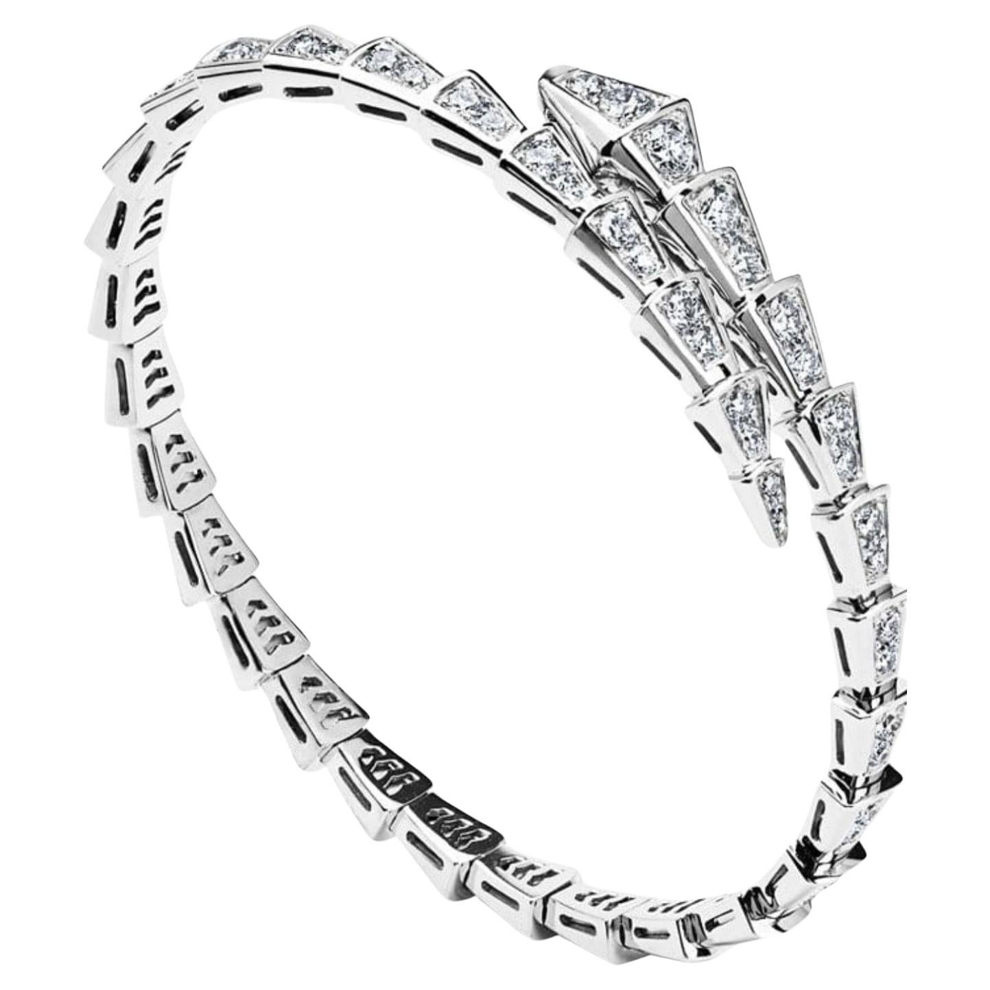 This bangle is not by Bvlgari 
18k White Gold 5 Ct Pave Diamond Serpenti Viper Slim Bracelet in a size small to medium is a tribute to the spirit animal, capturing seduction through a hypnotic design. This sophisticated jewel coils around the wrist,