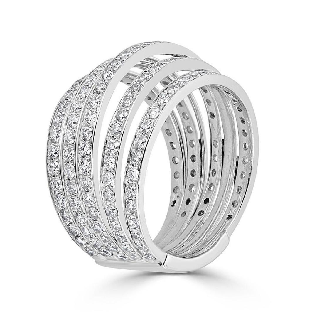 Exquisitely crafted in 18k White Gold, this 5 row domed pave diamond ring would make an unusual and astonishing wedding band or it can be wore as a fabulous statement cocktail ring. With a total 1.73 carat diamonds, these exceptional diamonds are