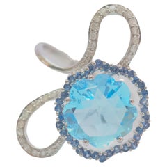 18K White Gold 5.14ct Fancy Blue Topaz, 0.65ct Sapphire 
Diamond Ring