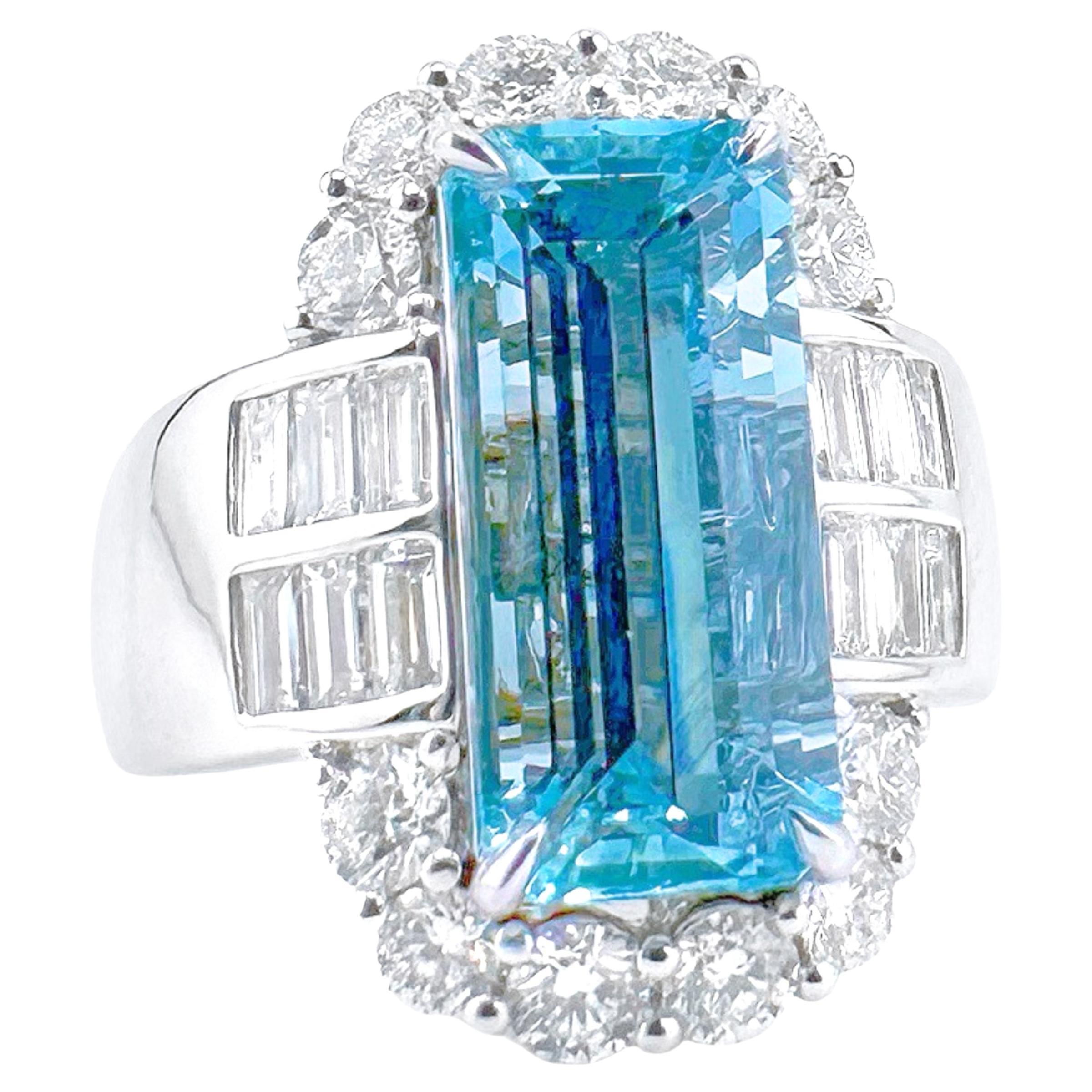 18K White Gold 5.52 CT Vivid Blue Aquamarine Ring with Baguette Diamonds For Sale