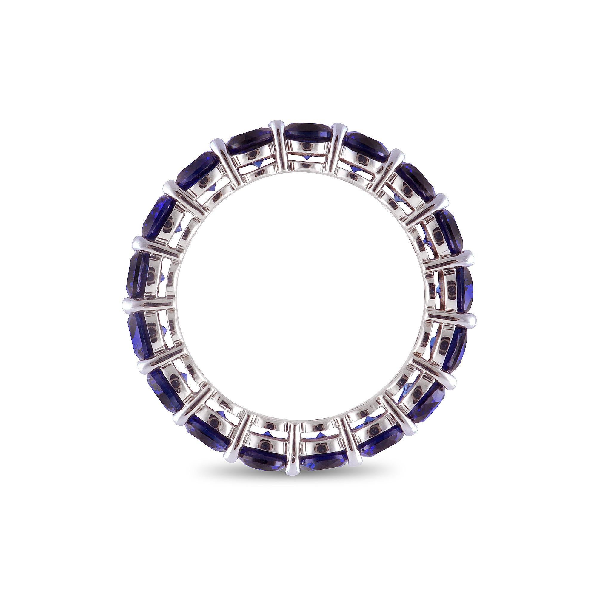 Ravishing 5.60 carat Sapphire eternity band with shared prongs. Perfect to compliment any ring stack and give it a pop of color. Ideal gift to give to your significant other as a push present or as an anniversary band, since the unbroken circle