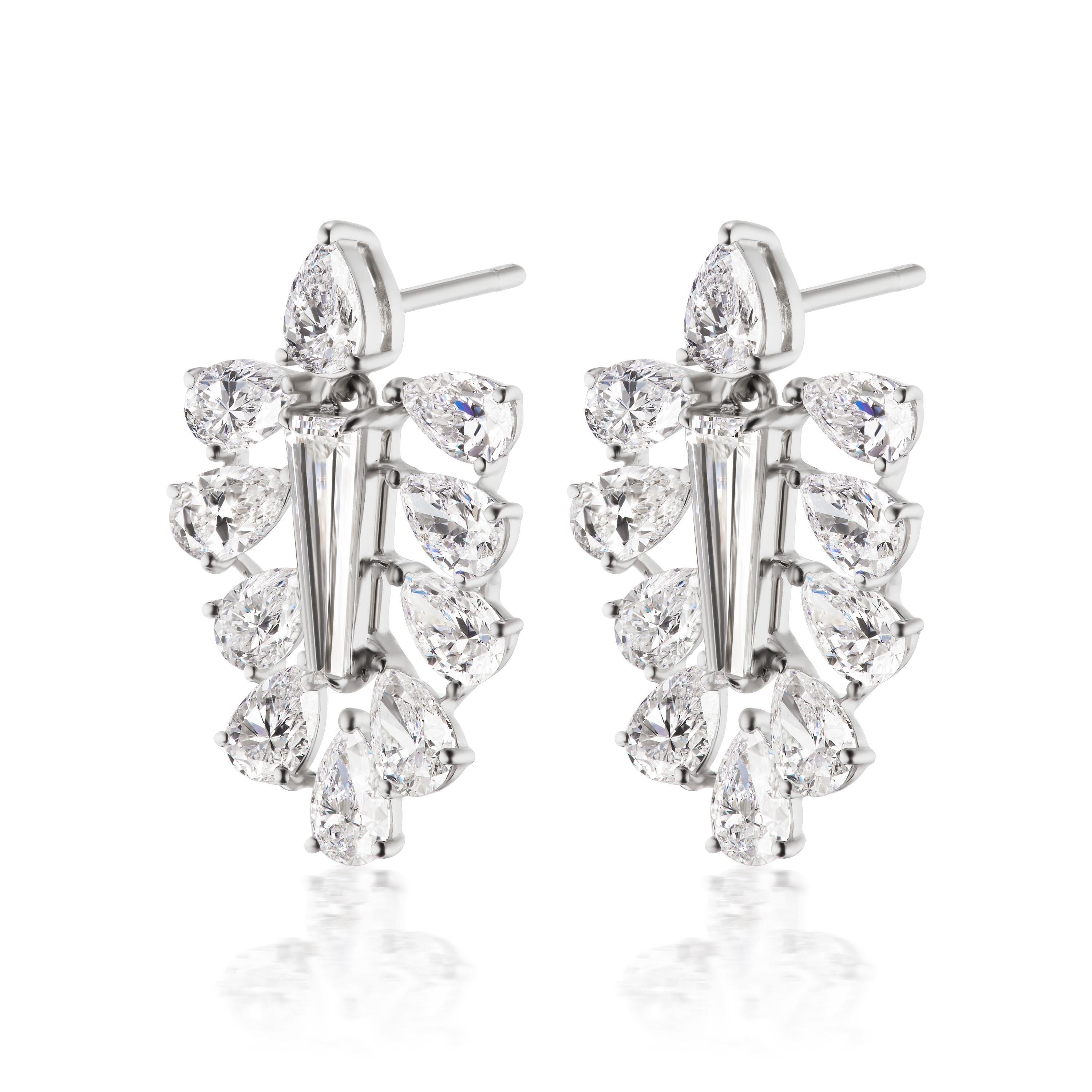 This elegant earring features 5.74 carats of pear full cut white diamonds arranged delicately to dazzle at every glance. These stud earrings are made of 18K White Gold and will be your favorite because of their simple and sophisticated design. The