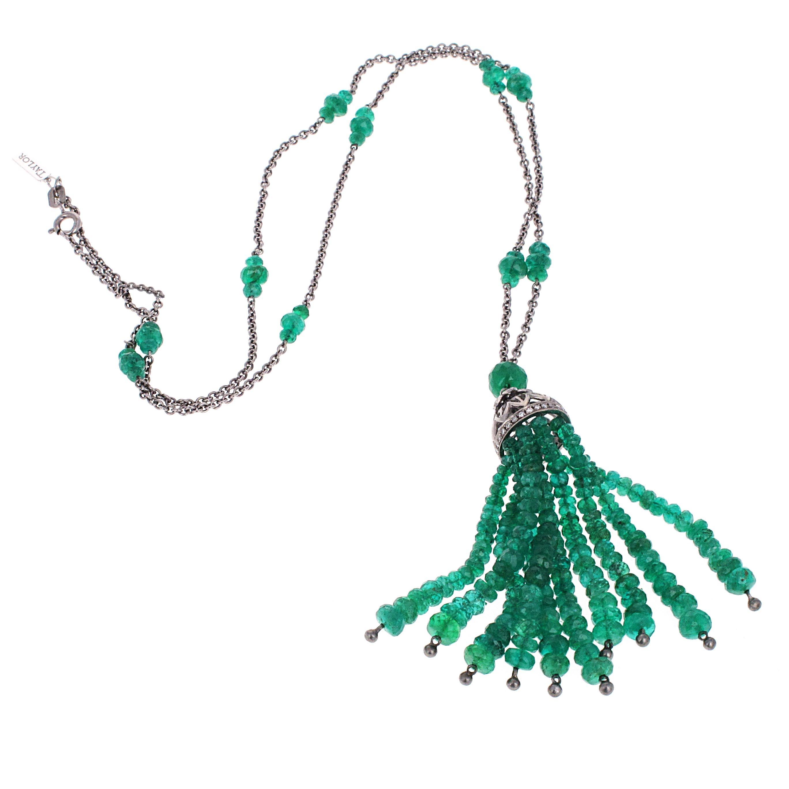 18k white gold  emerald and diamond tassel necklace from the Elizabeth Taylor collection. This necklace is not only extremely well made, but also super cool. The tassels move when you move and it is a fun piece that can be worn up or worn down. The