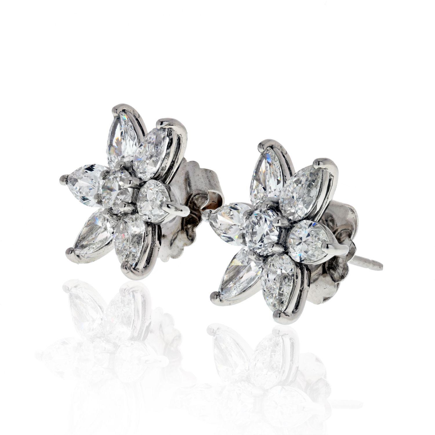 Lovely diamond starflower earrings from our estate collection. Crafted in 18k white gold with pear cuts and round diamonds these are a perfect gift for the Holidays. Posts with a heavy push backs will keep these secure in place. 
Total carat weight: