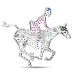 18K White Gold 6.50ct Diamond, Ruby, and Sapphire Horse and Jockey Brooch