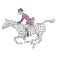 18K White Gold 6.50ct Diamond, Ruby, and Sapphire Horse and Jockey Brooch