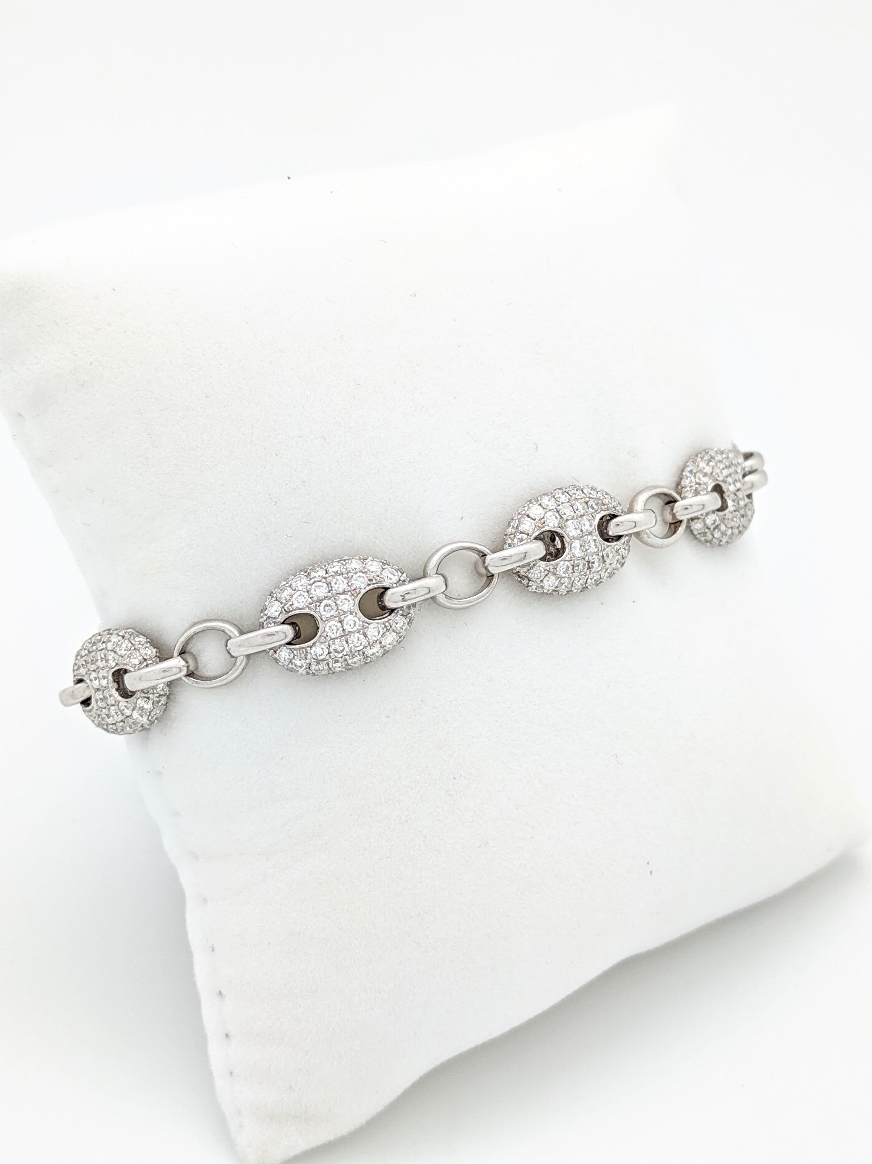 18k White Gold 6.88tcw Gucci Link Diamond Tennis Bracelet

You are viewing a Beautiful Diamond Tennis Bracelet that is sure to make a statement!

The bracelet is crafted from 18k white gold, measures 9mm in width and weighs 17.9 grams. It features