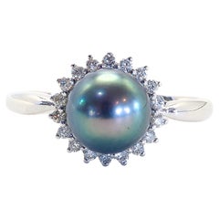 18K White Gold 6.9mm Greenish Tint Tahiti Pearl 
0.11ct Diamonds Halo Ring