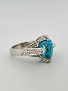 Bague en or blanc 18 carats Zircon bleu 7,00 carats Diamant naturel 1,10 carats