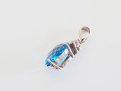 18K White Gold 7.67ct Oval Checker Blue Topaz & 0.12ct Diamond Pendant