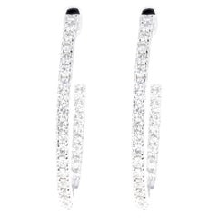 18K White Gold .80 Carat Total Weight Diamond Inside Out Oval Hoop Earrings