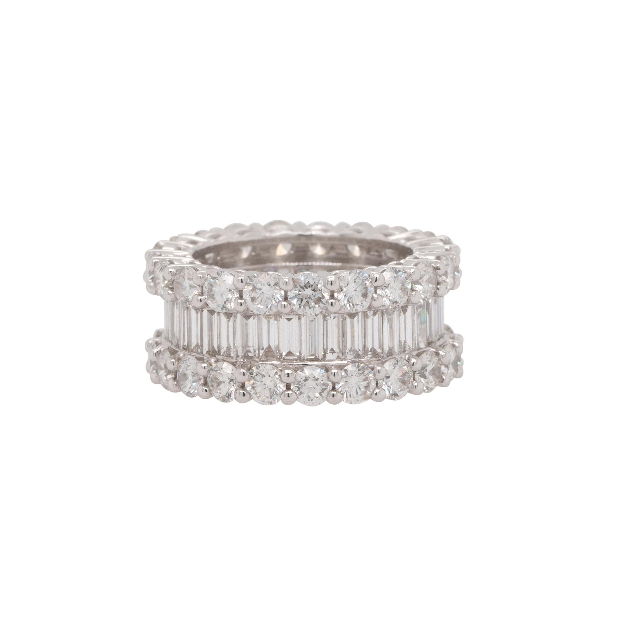 Material: 18k White Gold
Diamond Details: Approx. 8.55ctw of round and baguette cut Diamonds. Diamonds are G/H in color and VS in clarity
Ring Measurements: 25mm x 10 mm x 25mm
Ring Size: 7
Total Weight: 11.8g (7.6dwt)
Additional Details: This item