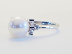 Bague en or blanc 18 carats perle des mers du sud 8 mm et 0,14 carats de diamants