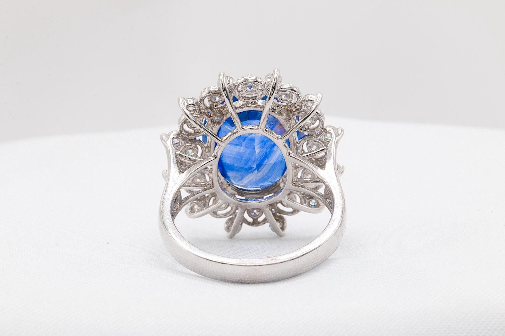 Oval Cut 9.27 Carat GIA Certified Sri Lanka Sapphire in 18k White Gold and Diamond Ring For Sale