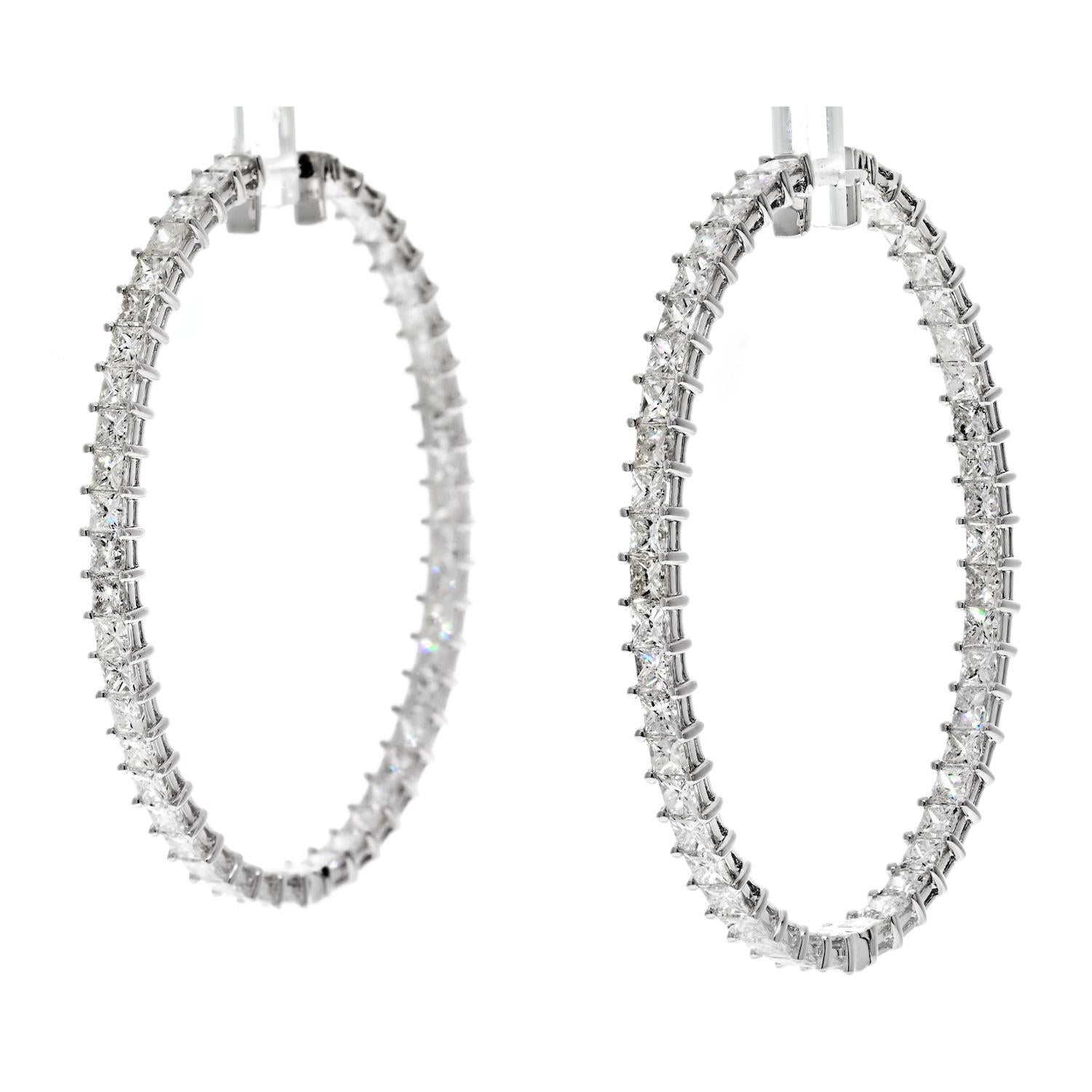 The 18K White Gold 9.62cttw Princess Cut Diamond Hoop Earrings are an exquisite piece of jewelry that exudes elegance and style. These round-shaped earrings feature a striking display of diamonds, mounted both inside and out, creating a stunning