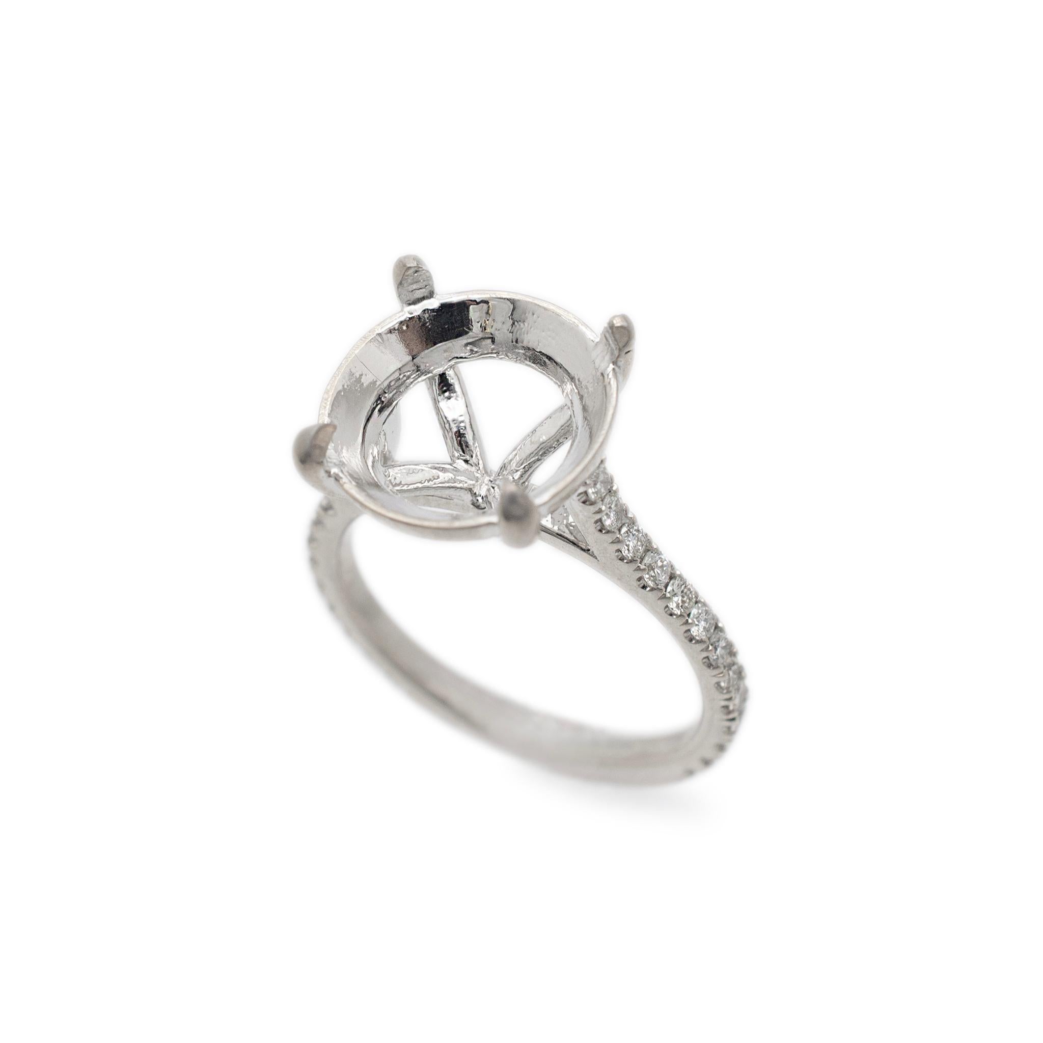Gender: Ladies

Metal Type: 18K White Gold 

Size:  4.75 

Shank maximum width: 1.70mm

Weight: 3.33 Grams

18K White Gold diamond engagement, accented ring with a half round shank. The ring is a size 4.75. The ring weighs a total of 3.33 grams. The