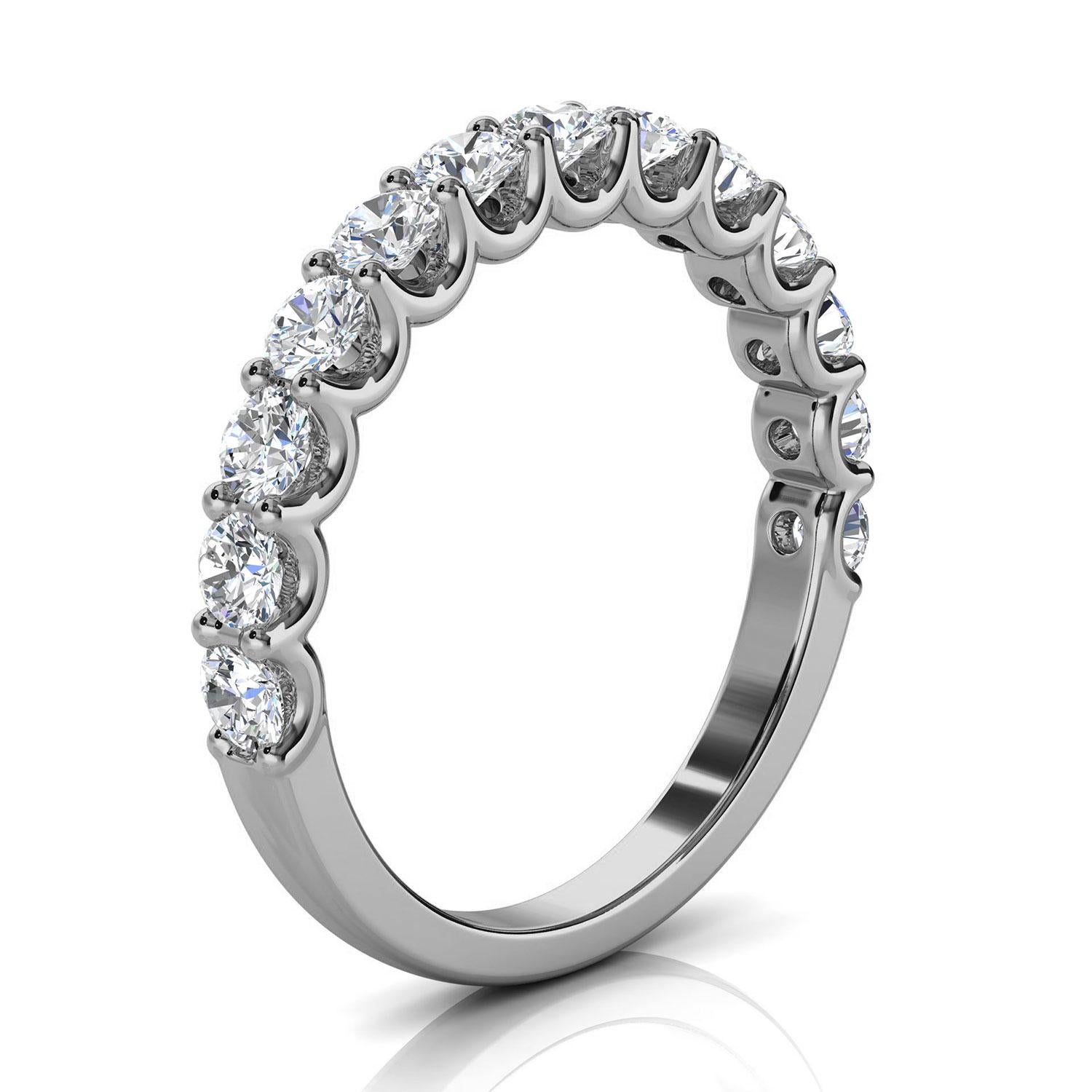 This ring features thirteen (13) perfectly matched brilliant round diamonds set on top of a 2 mm band. The 
