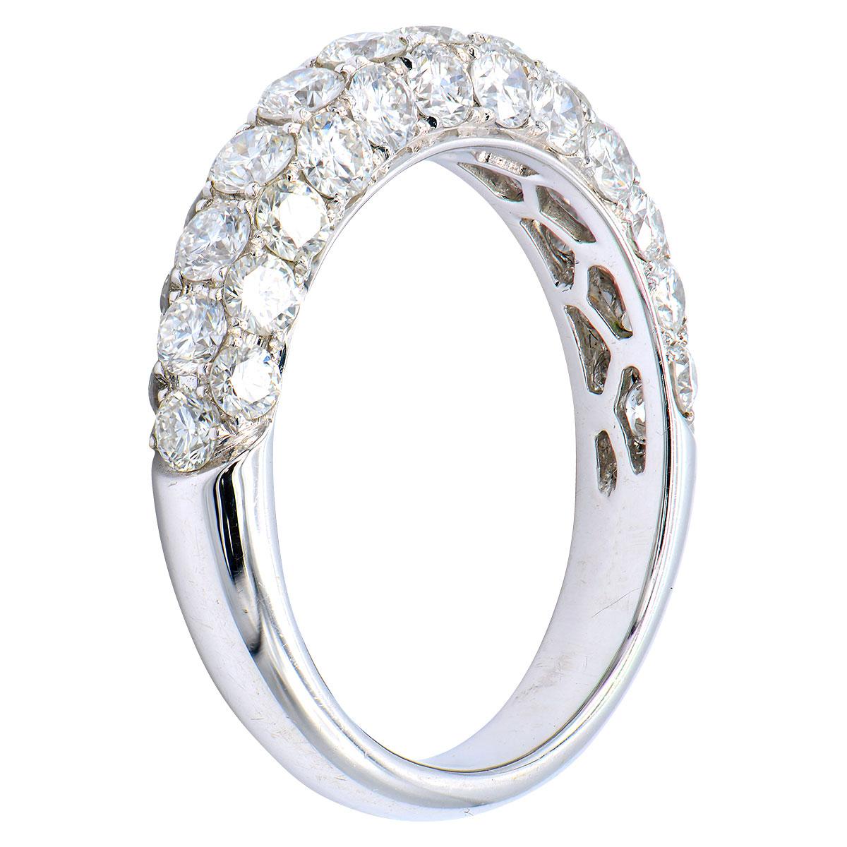 This beautiful band gives sparkle from every angle with diamonds down the center of the band as well as the top and bottom. There are 37 round VS2, G color diamonds totaling 1.80 carats that go halfway around the band. The diamonds are set in 4
