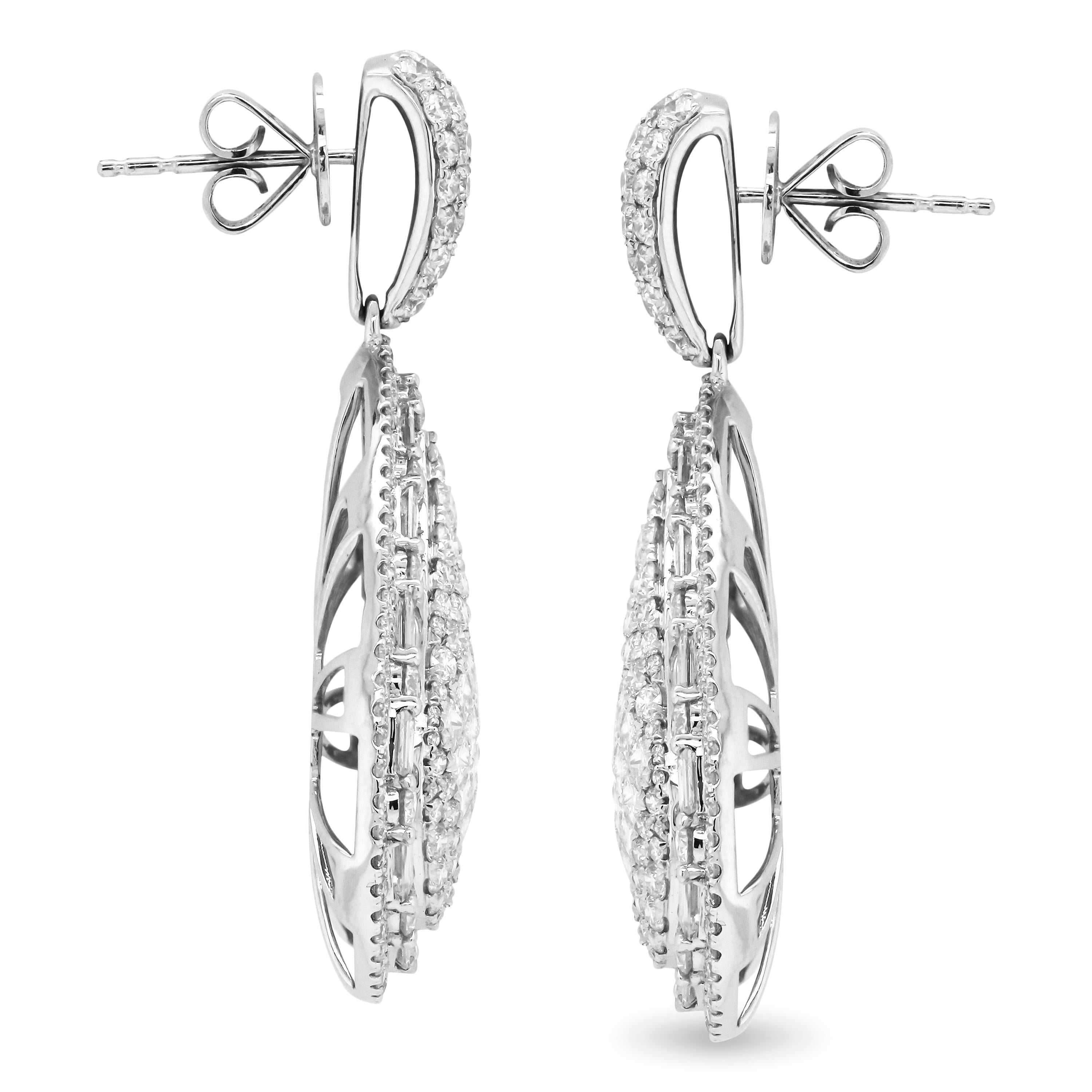 18K White Gold and 10.42 Ct Round Baguette Princess Cut Diamonds Drop Earrings

The statement earrings feature top quality Round, Baguette and Princess Cut Diamonds all throughout.

10.42 carat G color, VS clarity diamonds total weight

Earrings