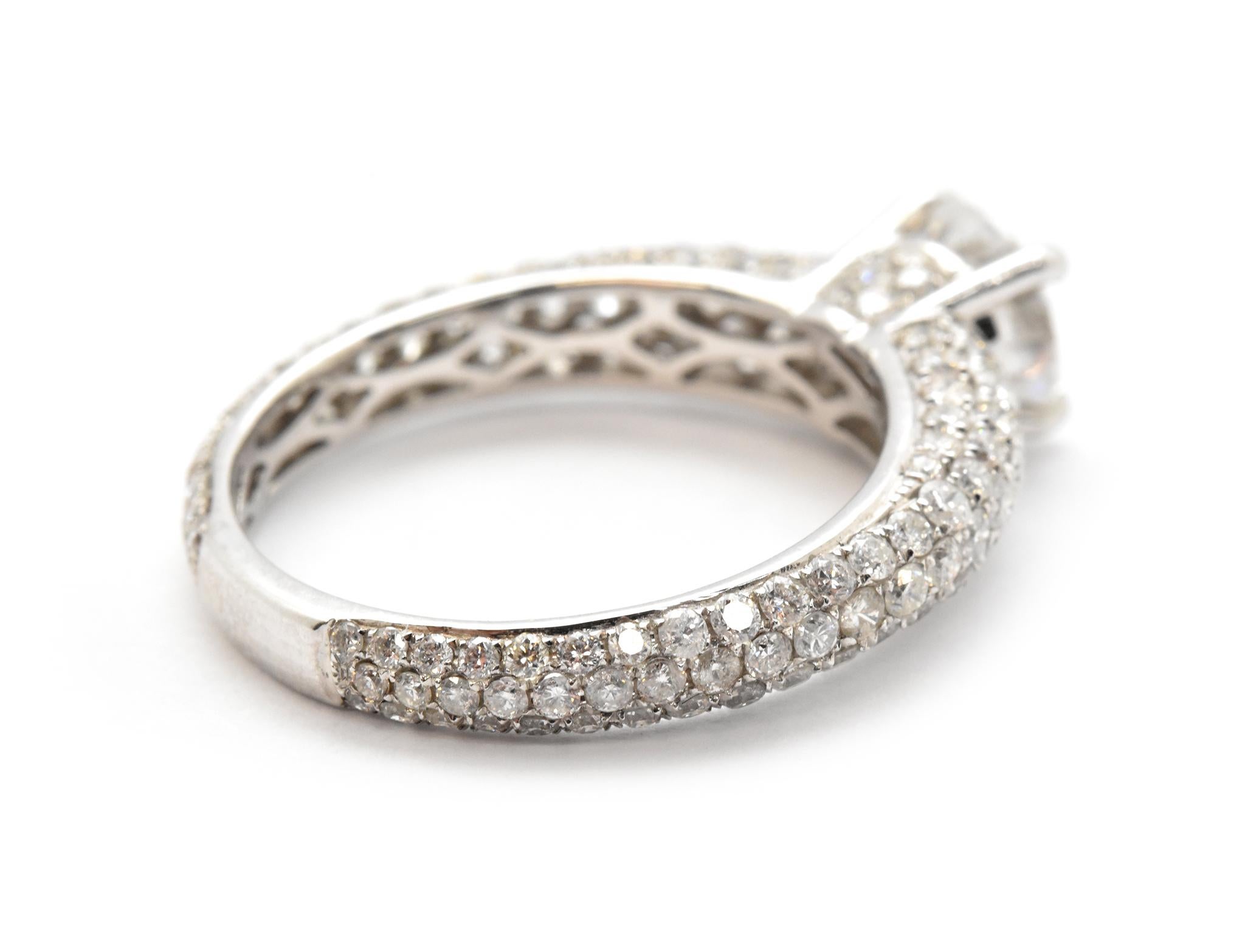 Round Cut 18 Karat White Gold and 1.05 Carat Round Diamond Ring with Pave Shank