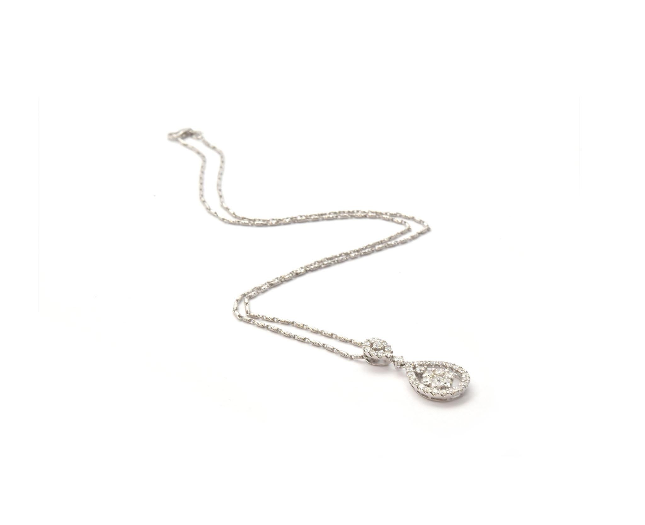 This gorgeous necklace features sparkling round diamonds set into 18k white gold. The diamonds have a total weight of 1.25 carats. The drop pendant measures 28x13mm, and the necklace measures 18” in length. The piece weighs 6.90 grams.