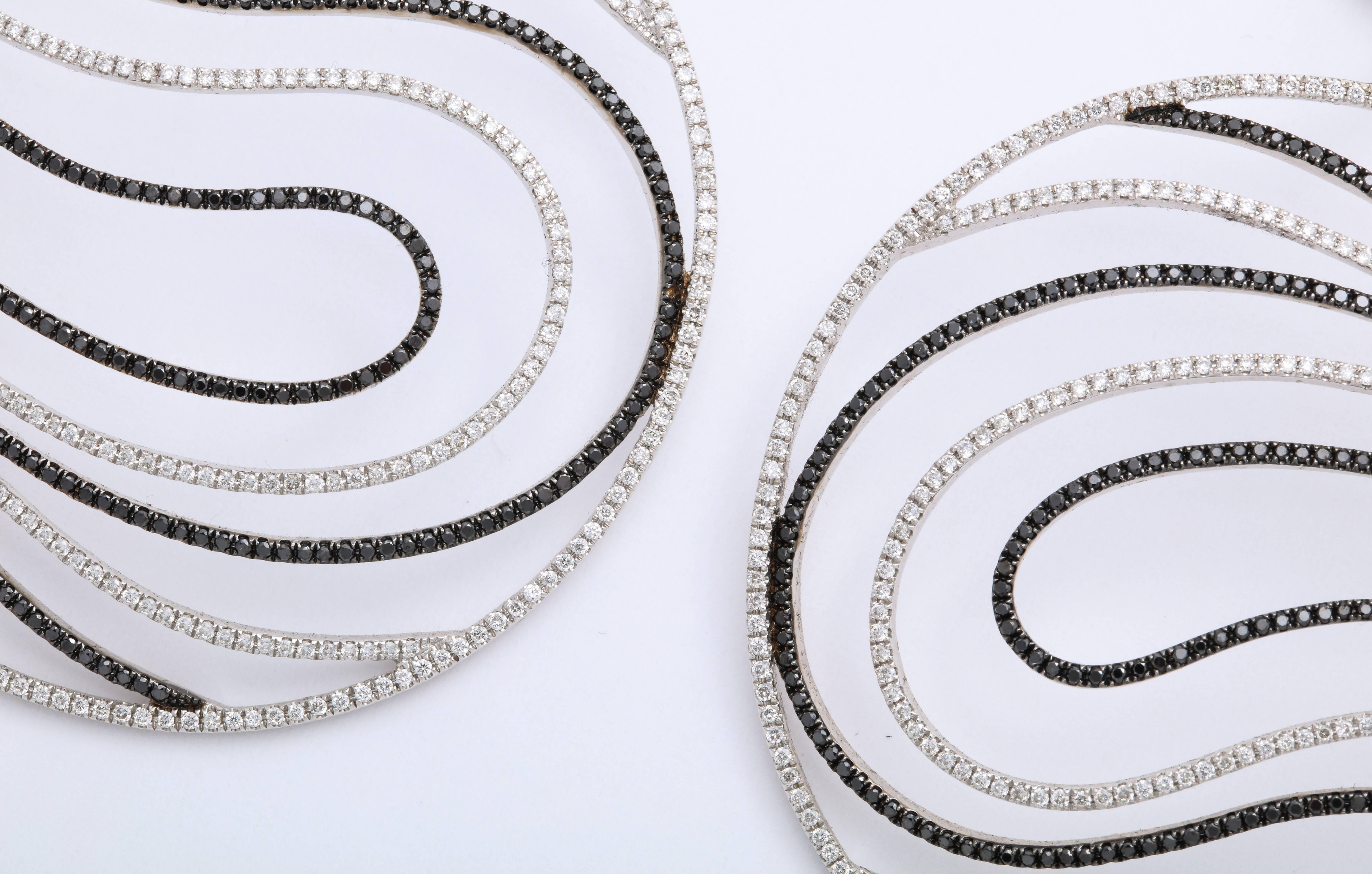 Modern 18 Karat Gold and Black and White Diamond Circular Disk Design Pendant Earrings For Sale