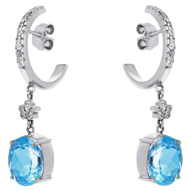 Orecchini in oro bianco 18 carati e topazio blu con diamanti