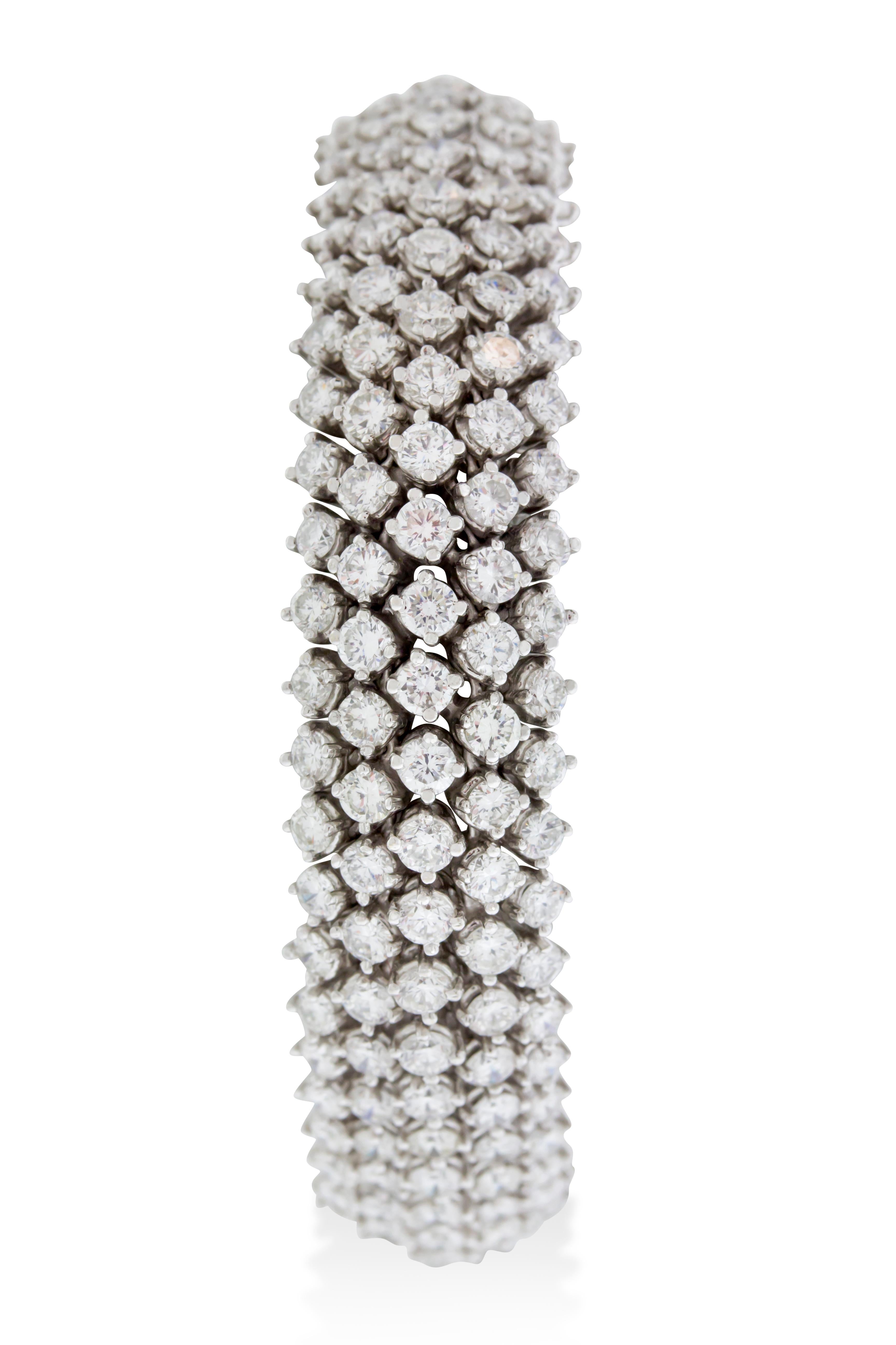 This tennis bracelet features five rows of G VS round diamonds set in white gold weighing 48.6 grams. 250 diamonds. 7 inch length. Made in Italy.

Resizing available upon request.

Viewings available in our NYC showroom by appointment.