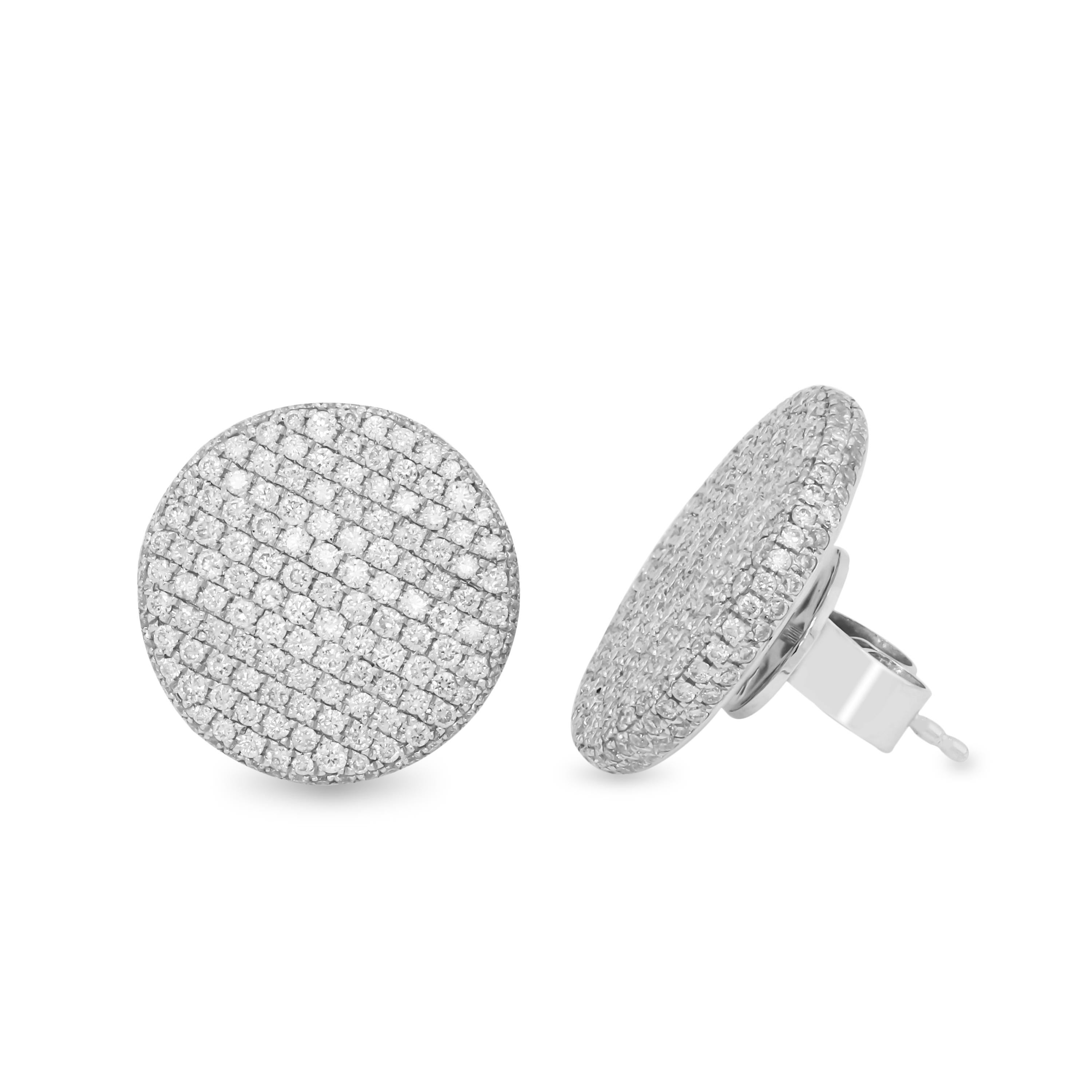 18K White Gold and Diamond Circle Disk Stud Earrings

These fun, everyday earrings feature a circle, disk design with pave set diamonds all throughout.

2.82 carat G color, VS clarity diamonds total weight

0.71 inch width. They are a perfect size