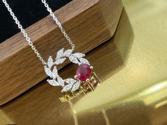 18K White Gold and Ruby Oval Olive Branch Necklace