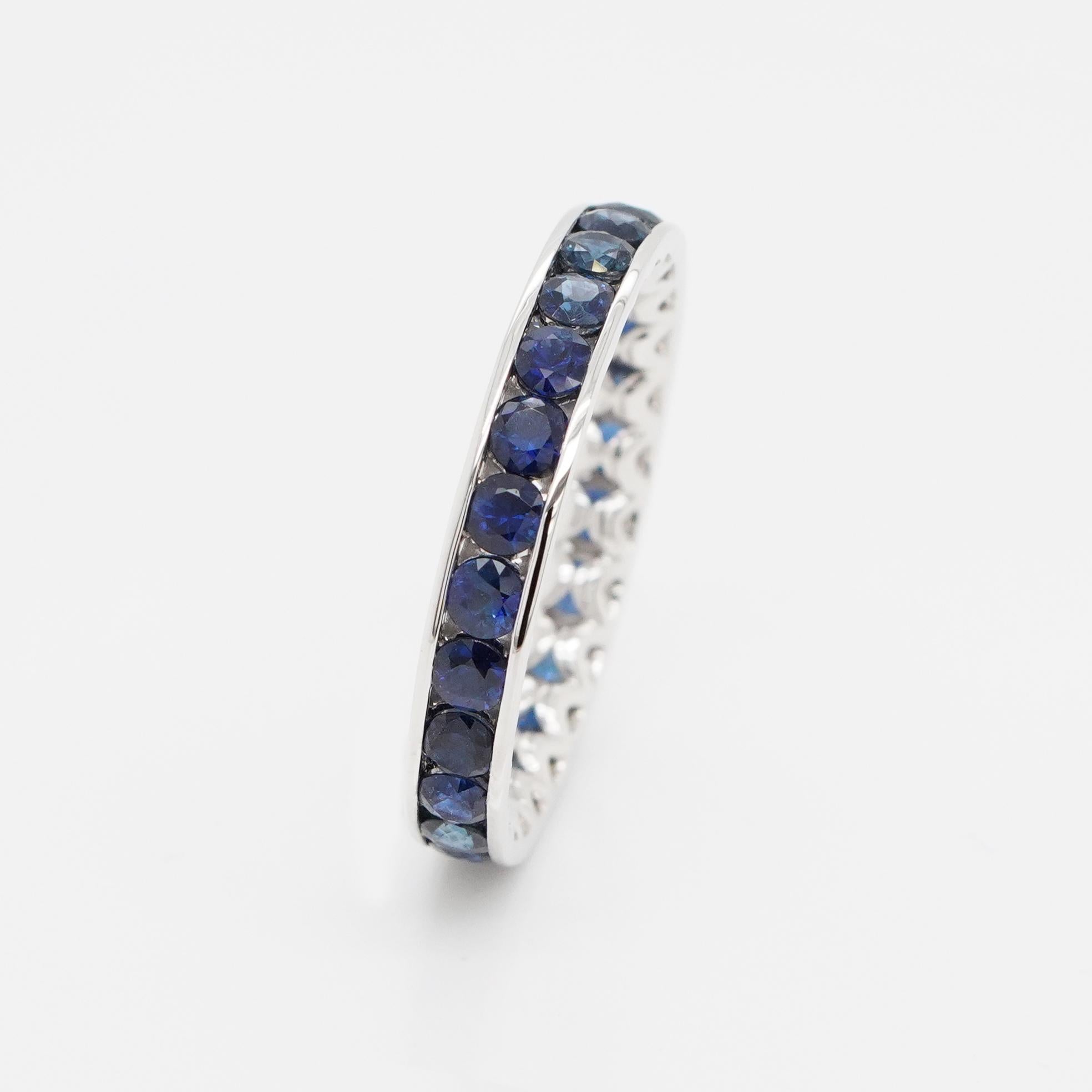 Round Cut 18K White Gold And Sapphire Eternity Band Ring 1.88 ct. For Sale