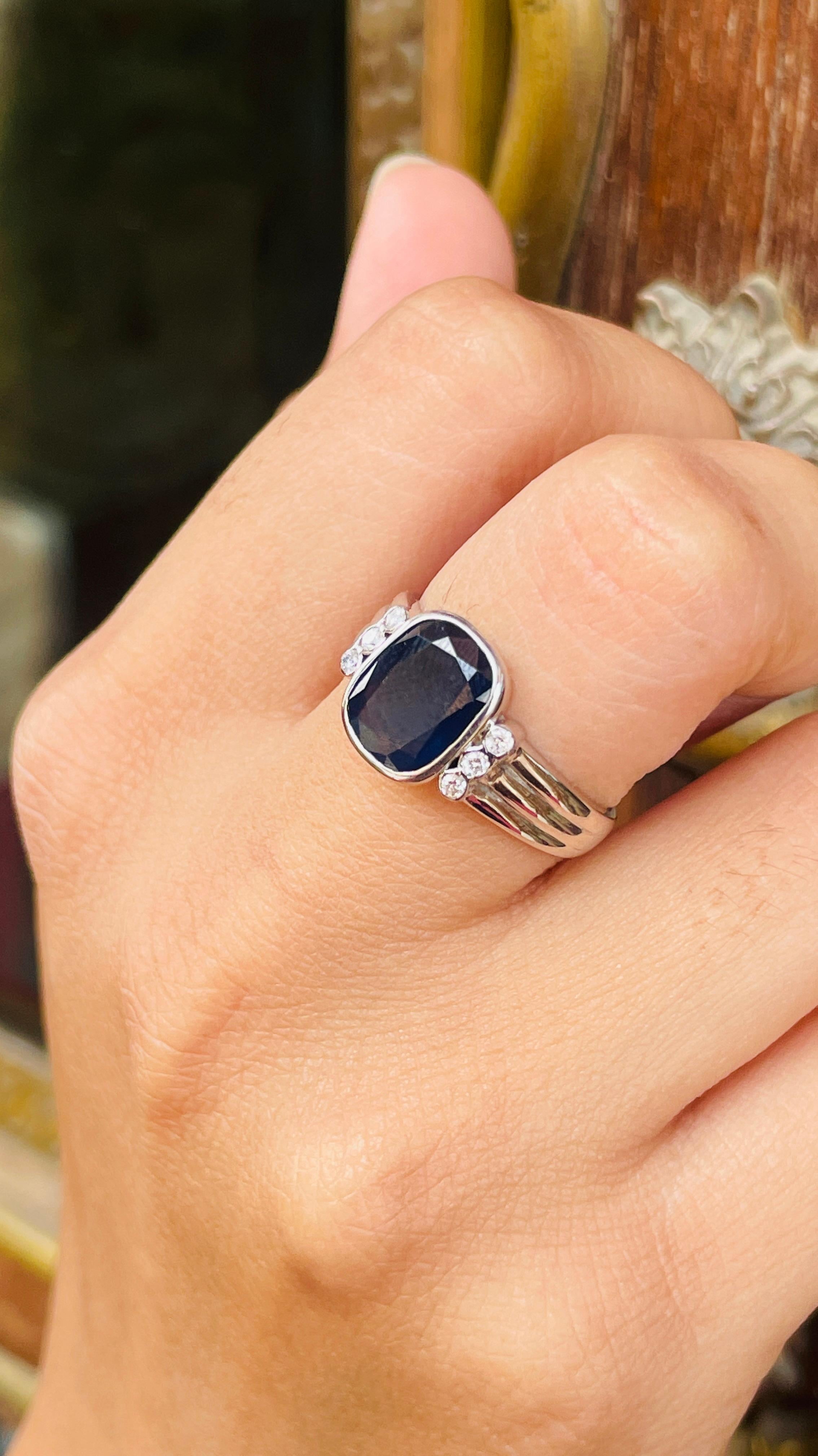 Blue Sapphire Ring with Diamonds in 18k Gold featuring natural sapphire of 2.74 carats and diamonds of 0.12 carats. The gorgeous handcrafted ring goes with every style.
Sapphire stimulate concentration and reduces stress.
Designed with cushion cut